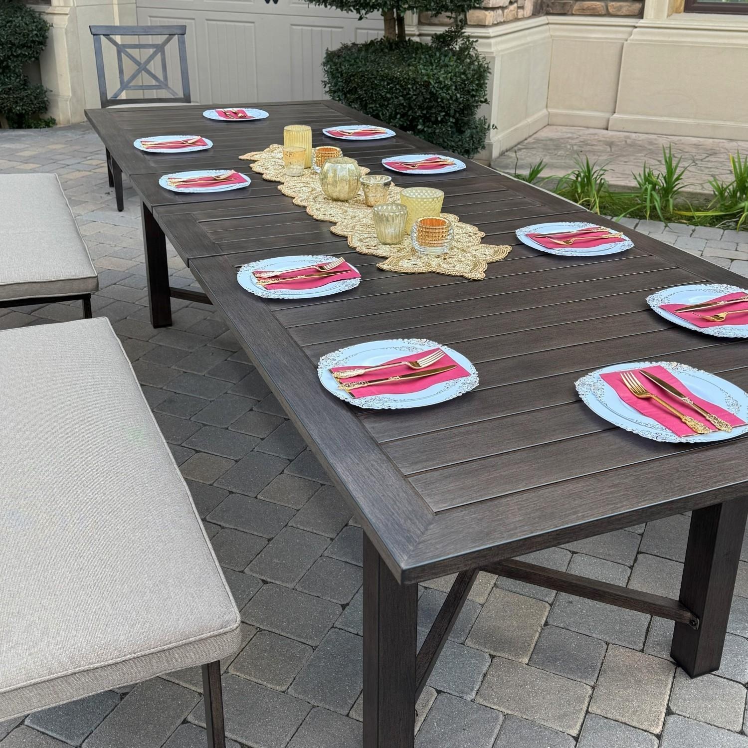 Atlantis 7 Pc Aluminum Dining Set w/ 2 Dining Side Chairs, 4 Two Person Benches & Extension Table in Walnut/Beige by Darlee - Table Angled - Lifestyle thumbnail