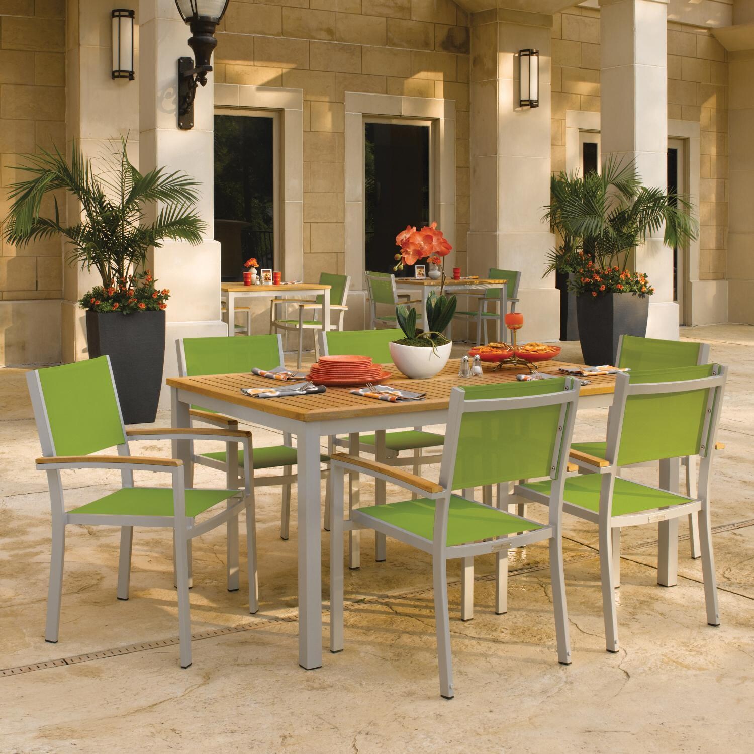 Oxford Garden Travira 7 Piece Flint Aluminum Patio Dining Set W/ Go Green Sling Armchairs & 63-Inch Rectangular Natural Tekwood Table thumbnail