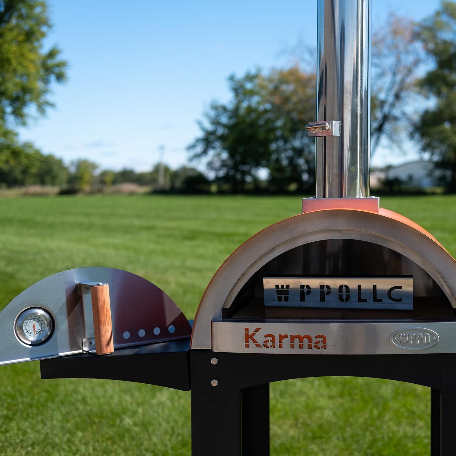 WPPO WKK-01S-WS-Orange Karma 25-in Wood Fired Pizza Oven w/ Black Cart - Orange - Door Off - Lifestyle thumbnail