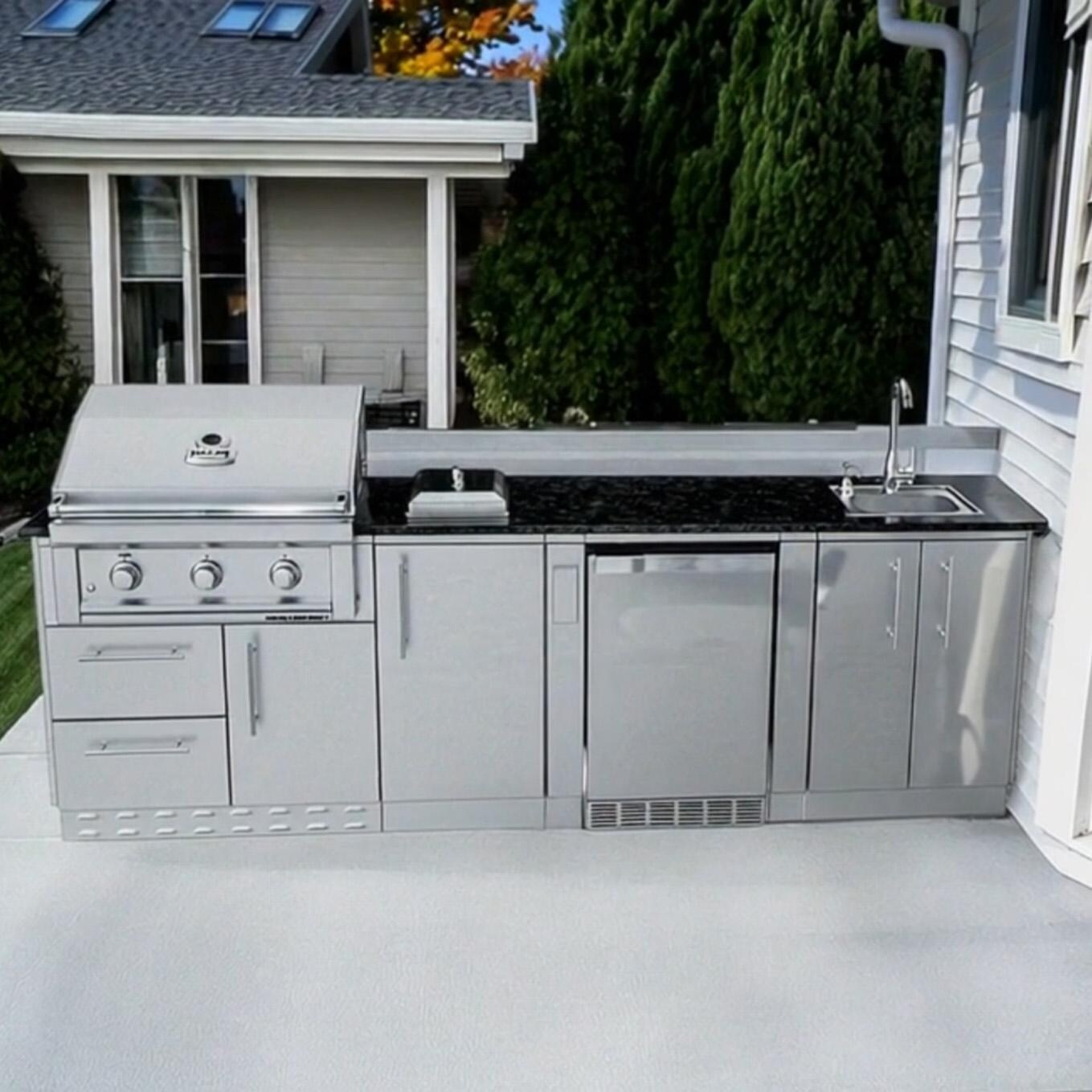 Sunstone Grills SCPBRAZOS9-LP Brazos 9 Ft Outdoor Kitchen Island w/ Propane Grill & Side Burner, Sink, Door & Drawer - On Patio - Lifestyle thumbnail