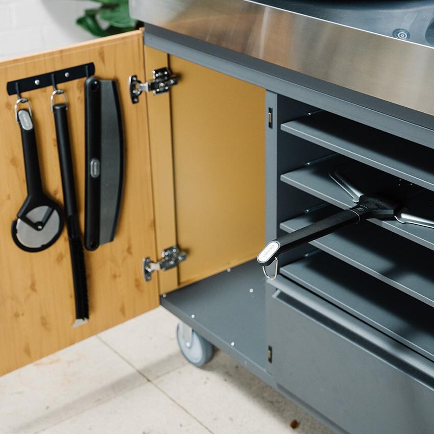 Everdure EPBRUSH Pizza Oven Brush - Brush Hanging on Accessory Rack thumbnail