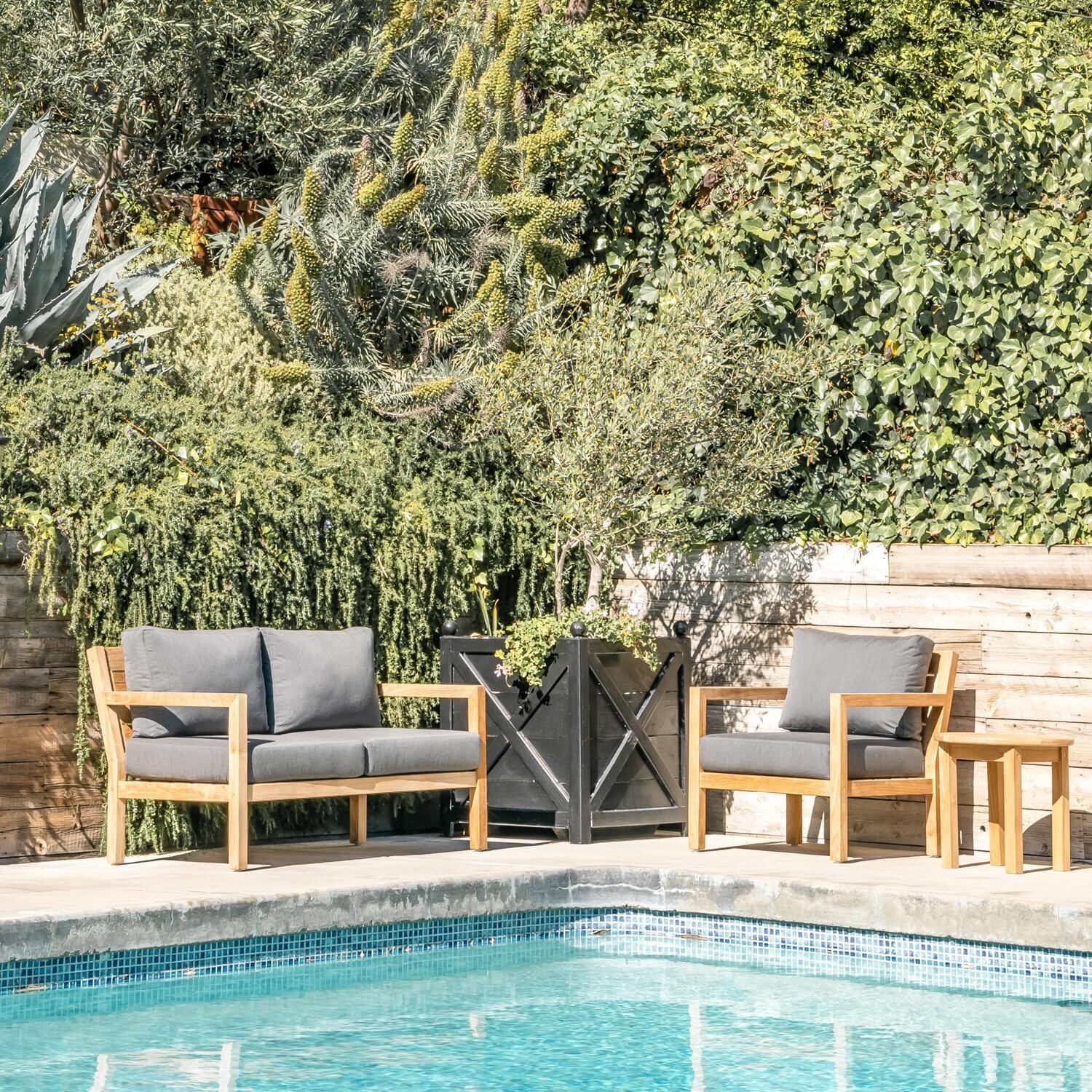 Teak + Table Monday Teak Patio Loveseat in Natural - Poolside - Lifestyle thumbnail