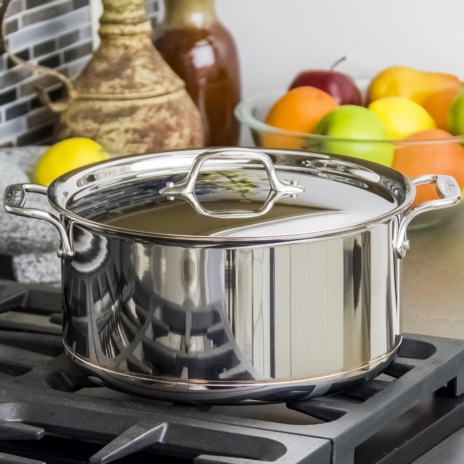 All-Clad Copper-Core 8-Quart Stockpot With Lid In Use thumbnail