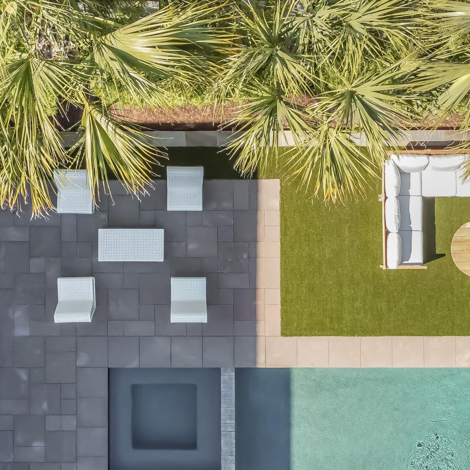 Teak + Table Breeze Wicker Patio Armless Club Chair in Off-White Cane - Birds Eye View - Lifestyle thumbnail