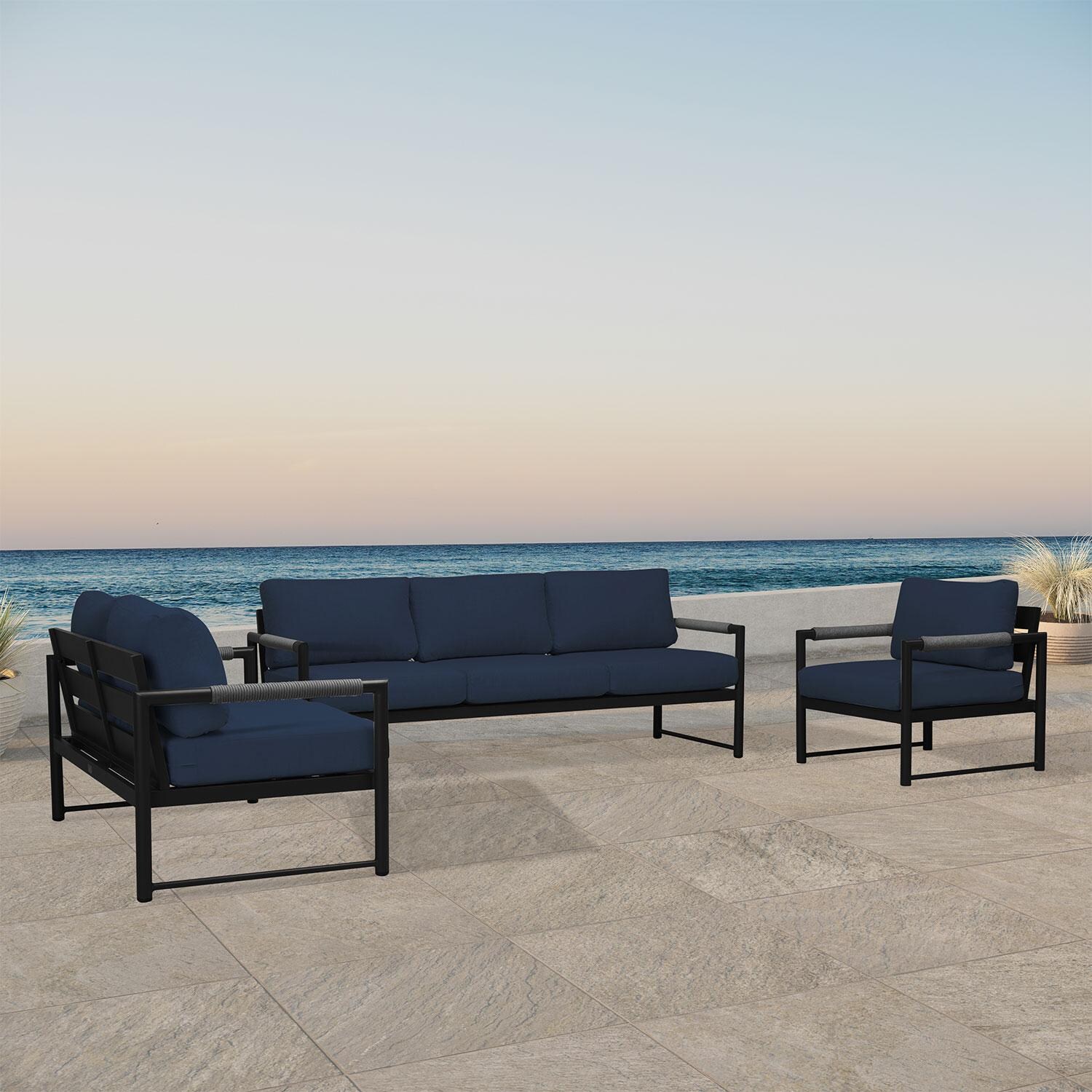 Lakeview AVEBAY-BK-CO-SET143-IN Avenue Bay Black/Carbon 3 Pc Sofa Loveseat Set - Spectrum Indigo - Angled On Patio - Lifestyle thumbnail