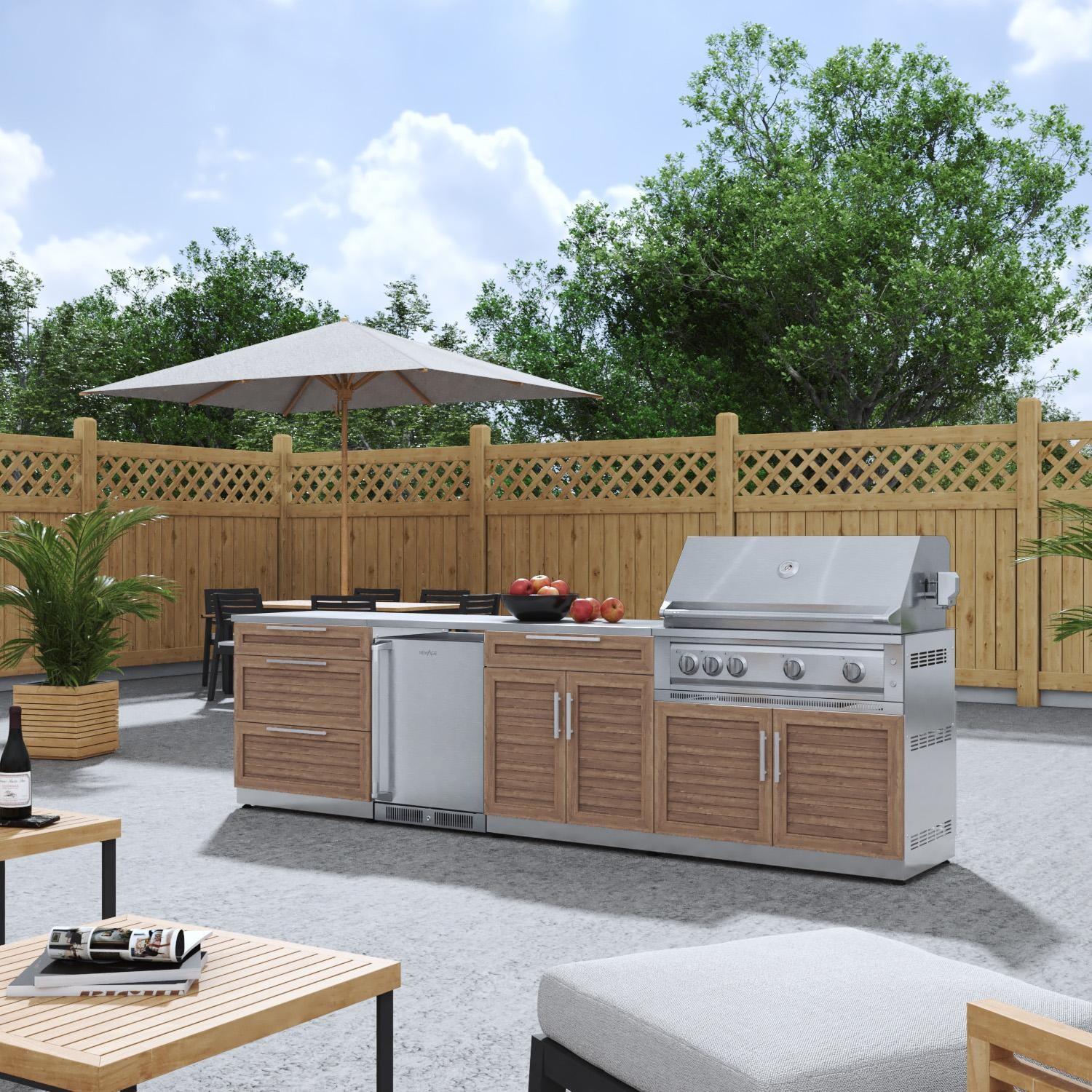 NewAge Products 67900 Classic Series 10 1/2 Ft Outdoor Kitchen Island w/ 40-in Propane Grill, Refrigerator, Trash Bin, Door & Drawer in Grove/Stainless Steel - Angled on Patio - Lifestyle thumbnail