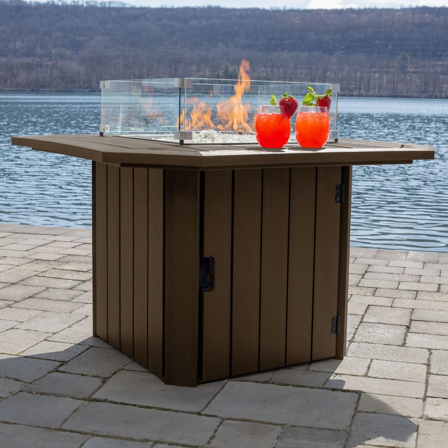 Harborview Octagonal Fire Pit Table in Weathered Acorn by Lakeview Outdoor Designs - Side View - Lifestyle thumbnail