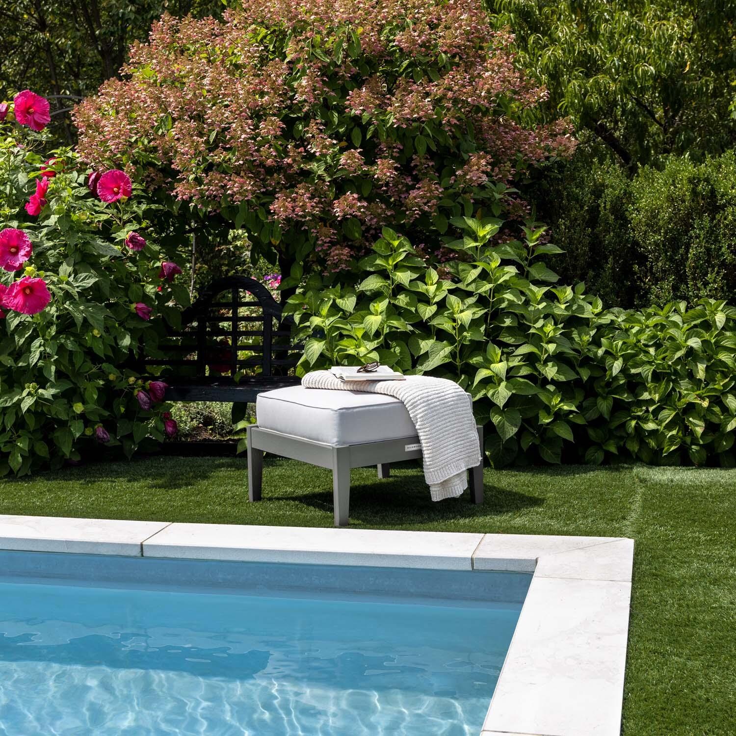 Blushing Bay Recycled Plastic Ottoman in Bliss Linen/Coastal Teak by Lakeview Outdoor Designs - By Pool - Lifestyle thumbnail