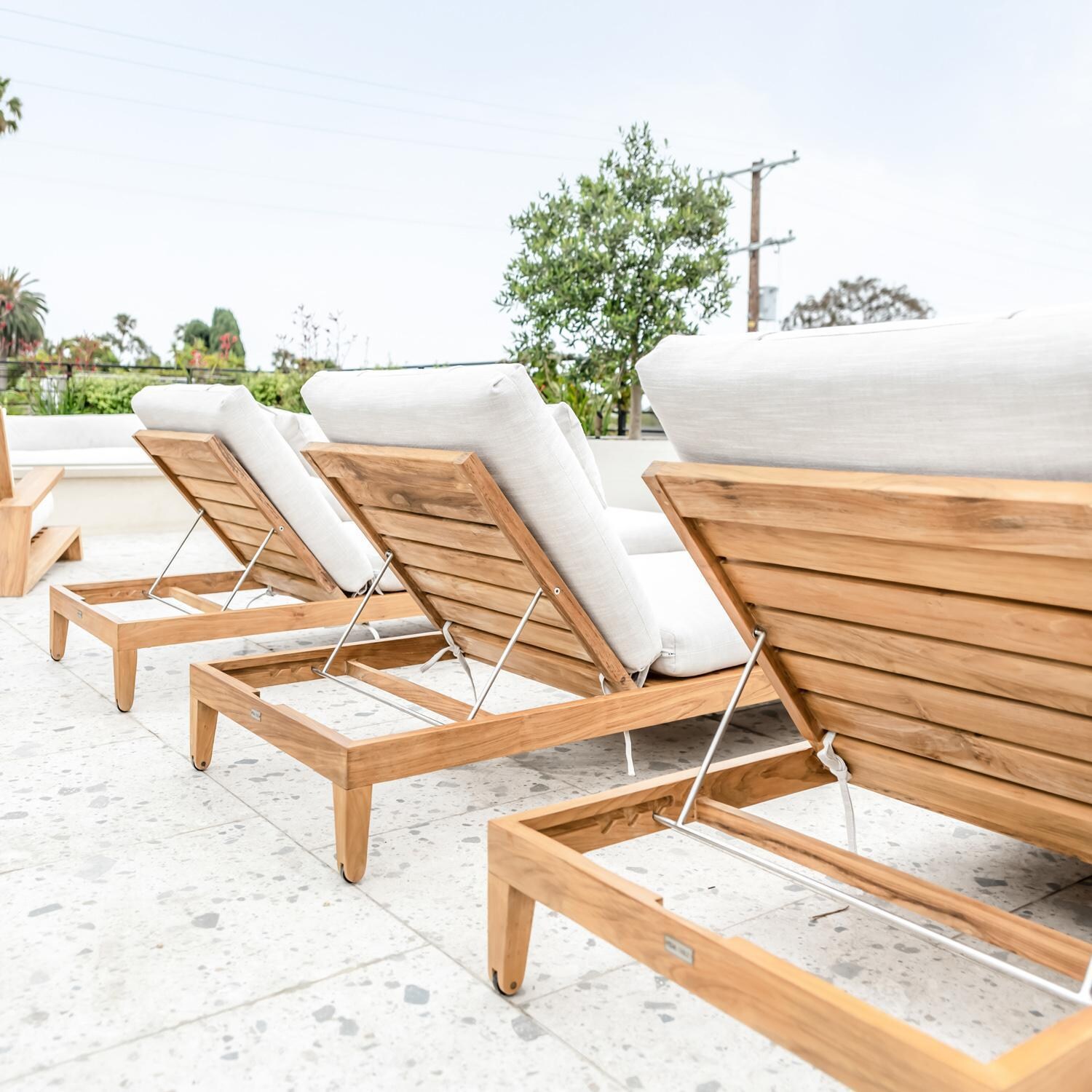Teak + Table Monday Teak Patio Chaise Lounge in Natural - Back (Only 1 Chaise Included) - Lifestyle thumbnail