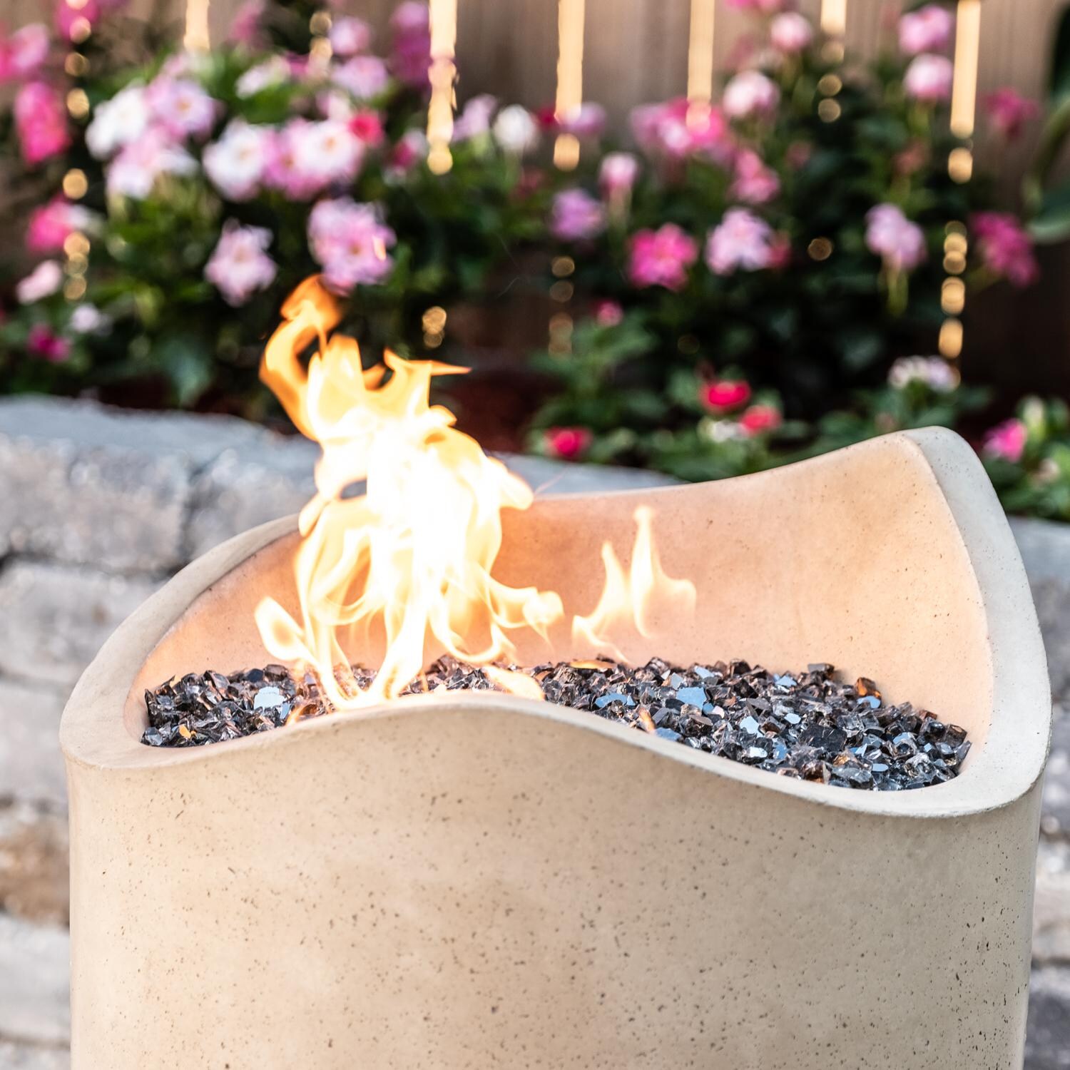 American Fyre Designs Wave 20-Inch Gas Fire Urn - Cafe Blanco - Lifestyle - Shown with Alpine Flame Storm Gray Fire Glass (Sold Separately) thumbnail