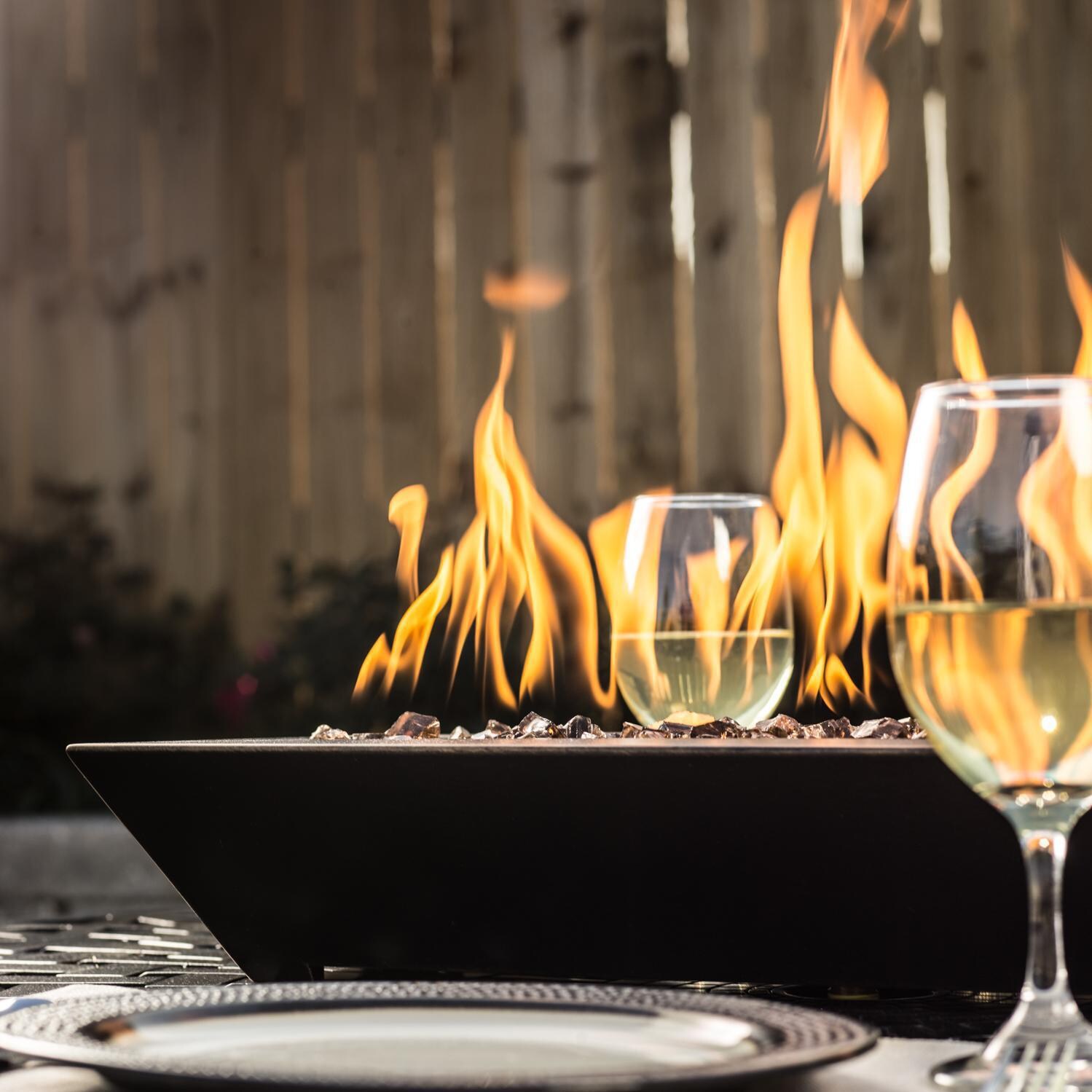 BBQGuys Signature Series Westfalen 18-Inch Table-Top Propane Fire Pit - Oil Rubbed Bronze - Side View - Shown with 1/2 inch Roman Bronze Reflective Fire Glass (Sold Separately) thumbnail