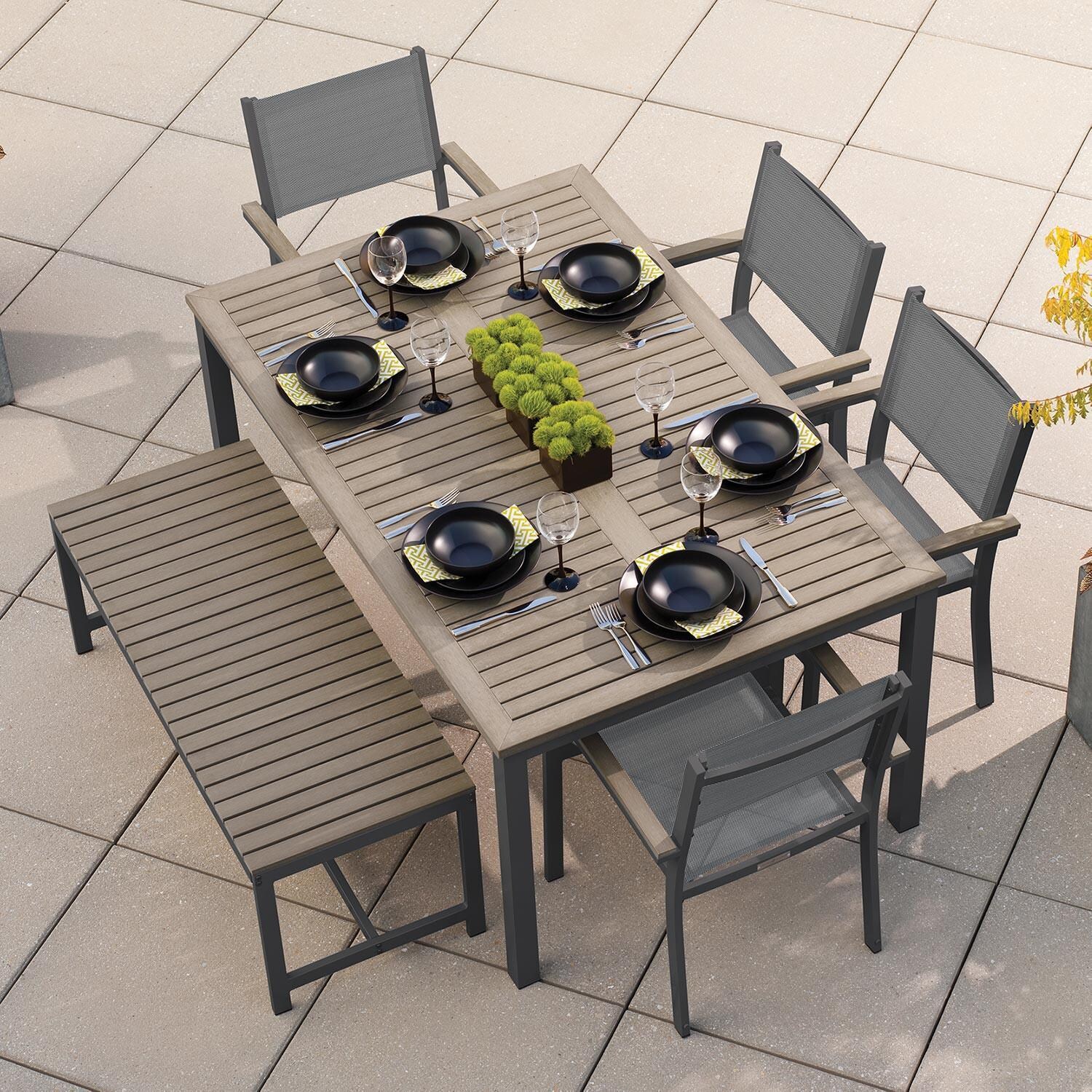 Oxford Garden Travira 6 Piece Carbon Aluminum Patio Dining Set W/ Titanium Sling Armchairs, 63-Inch Rectangular Vintage Tekwood Table & Backless Bench thumbnail