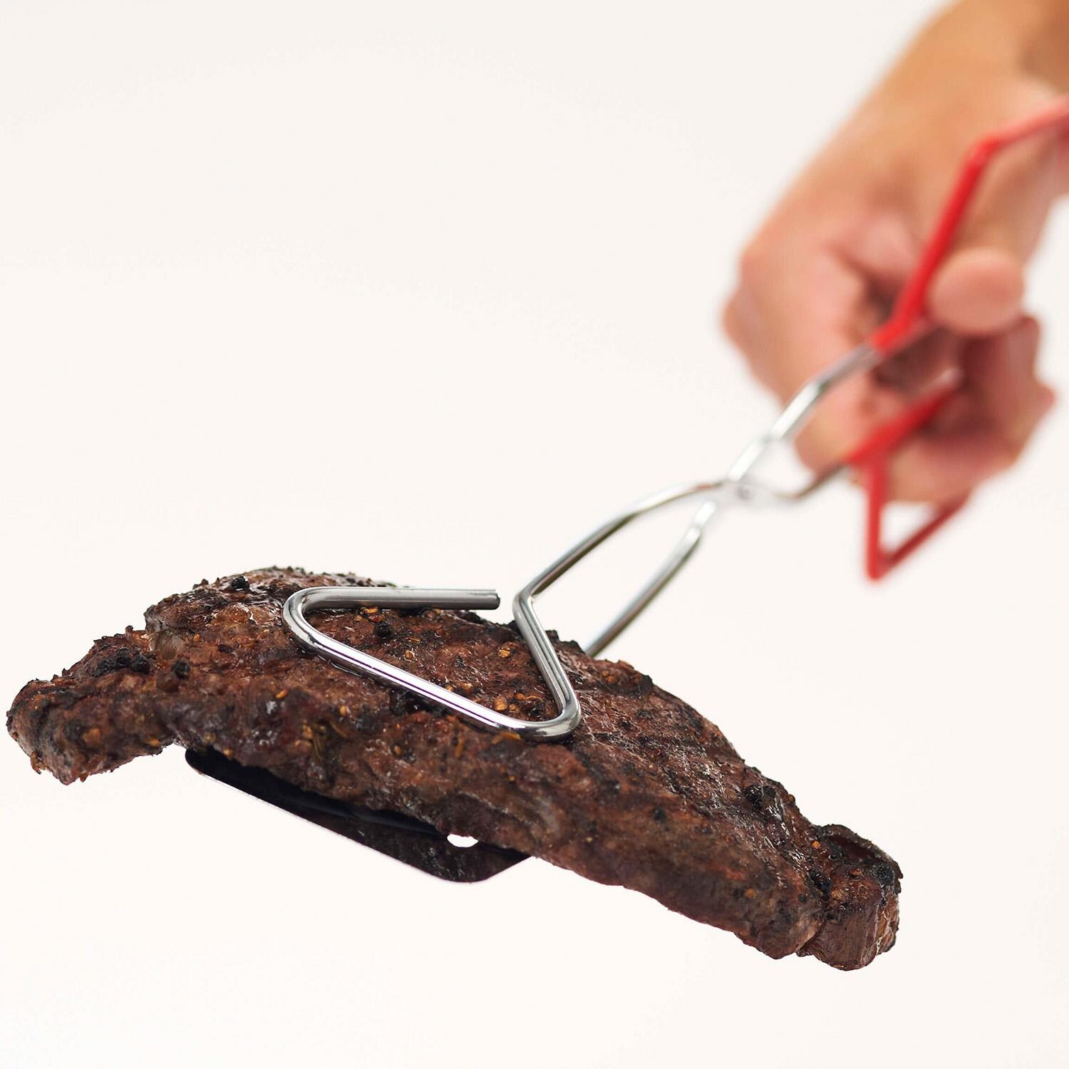 GrillPro Chrome Plated 2-in-1 Turner/ Tongs - 40730 - Holding Meat 2 - White Background thumbnail