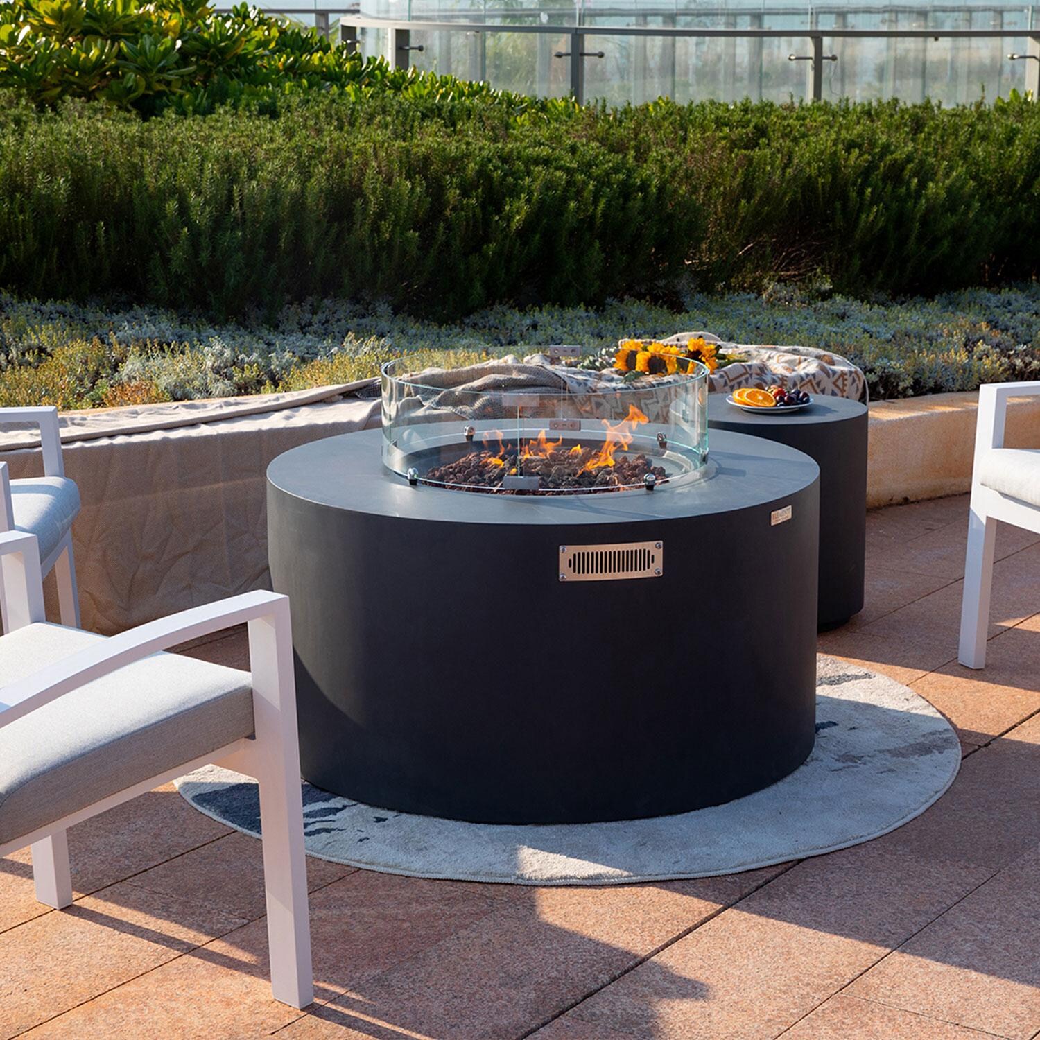 Elementi OFG311DG-LP Pacaya 43-in Liquid Propane Concrete Fire Table with Hidden Tank in Dark Grey - Wind Guard - On - Lifestyle thumbnail