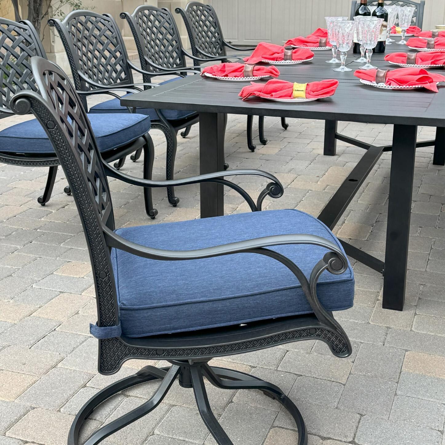 Darlee B/DL13-11PCDR-2350LE-N Nassau 11 Pc Cast Aluminum Dining Set w/ Rocker in Antique Bronze w/ Navy Cushions - Chair Angle - Lifestyle thumbnail