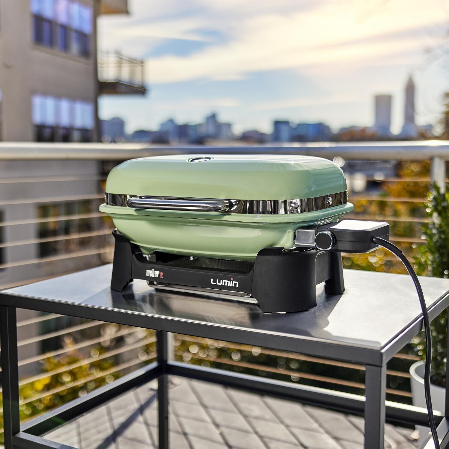 Weber 91070901 Seafoam Green Lumin Compact Portable 1560 Watt Electric Grill - Lifestyle thumbnail