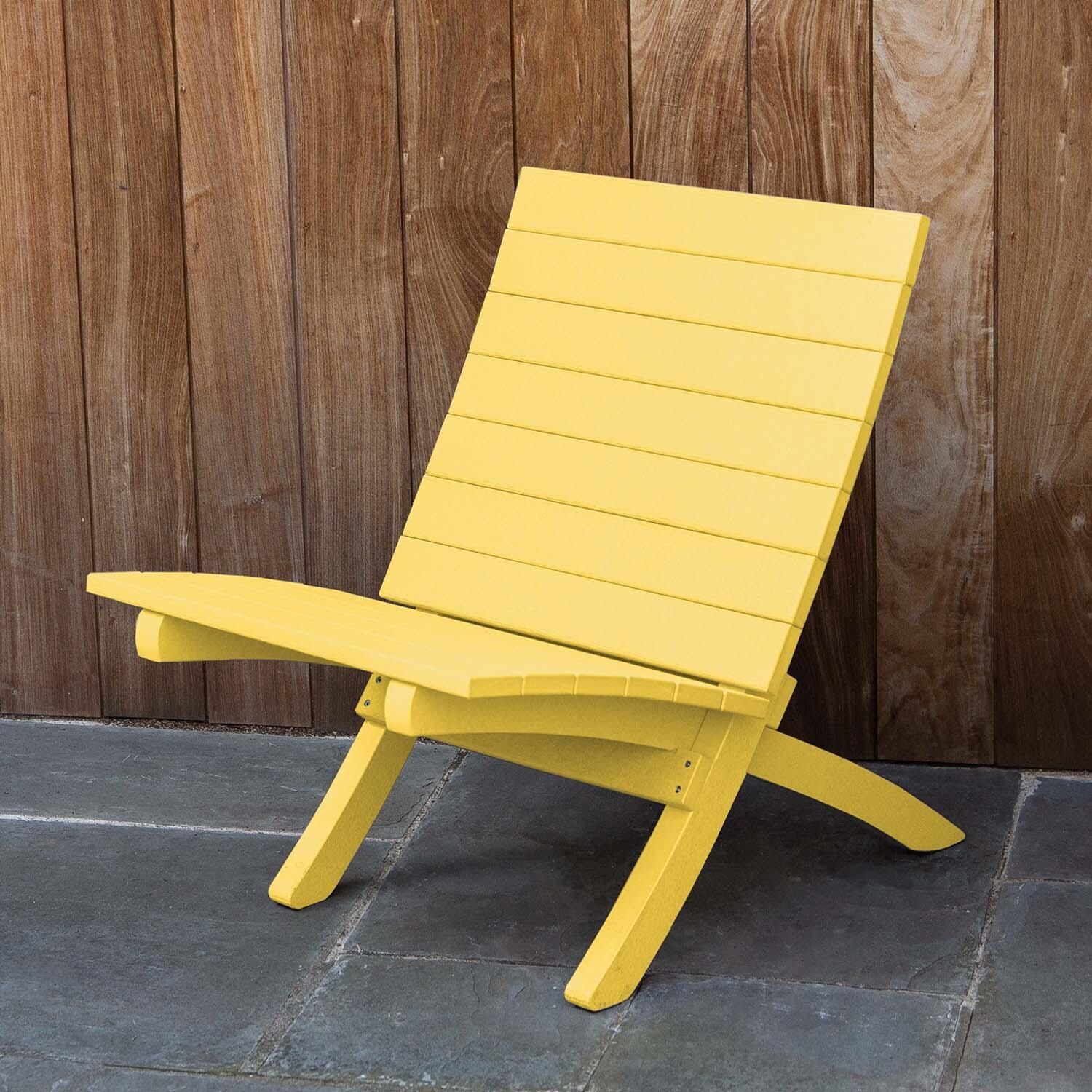 Hazel Cove Recycled Plastic Folding & Stacking Dining Side Chair in Sunbeam Yellow by Lakeview Outdoor Designs - Lifestyle thumbnail