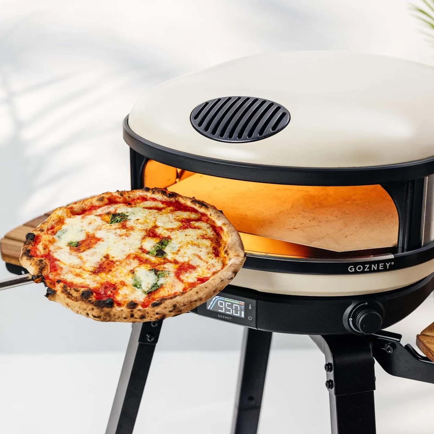 Gozney GAPBNUS1624 Bone Arc XL Propane Pizza Oven Essentials Bundle - Pizza on Peel - Lifestyle thumbnail