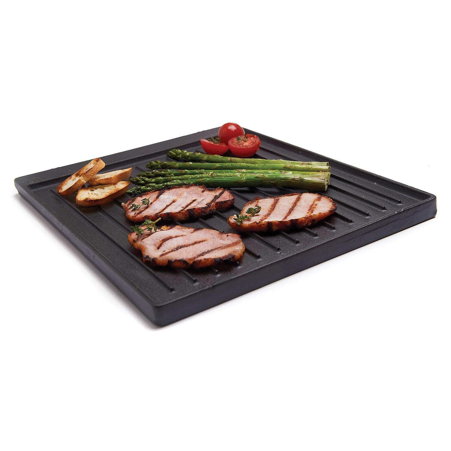 Broil King Cast Iron Monarch Griddle - 11223 - Griddle w/ Ridges & Food - White Background thumbnail