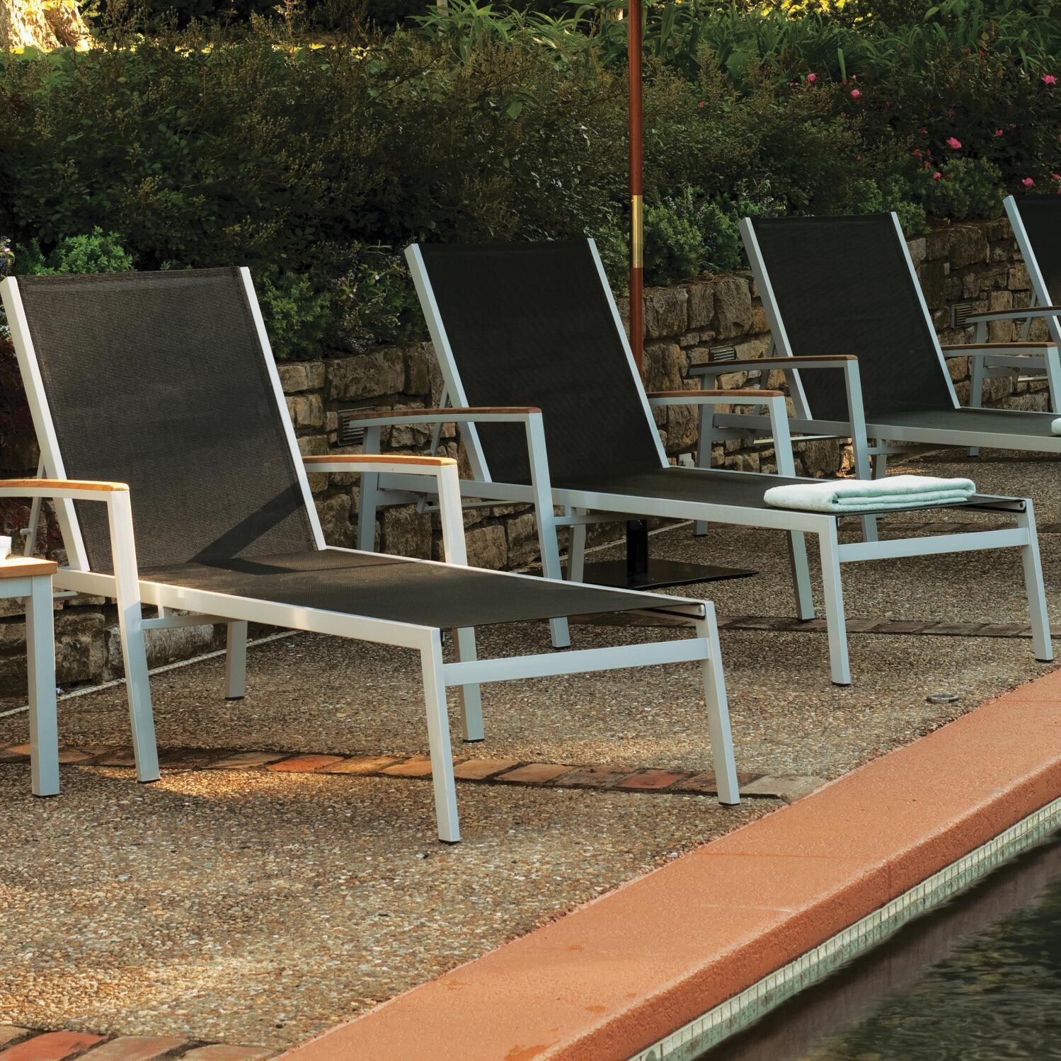 Travira Aluminum Patio Chaise Lounge W/ Black Sling & Teak Armcaps By Oxford Garden - By the Pool thumbnail