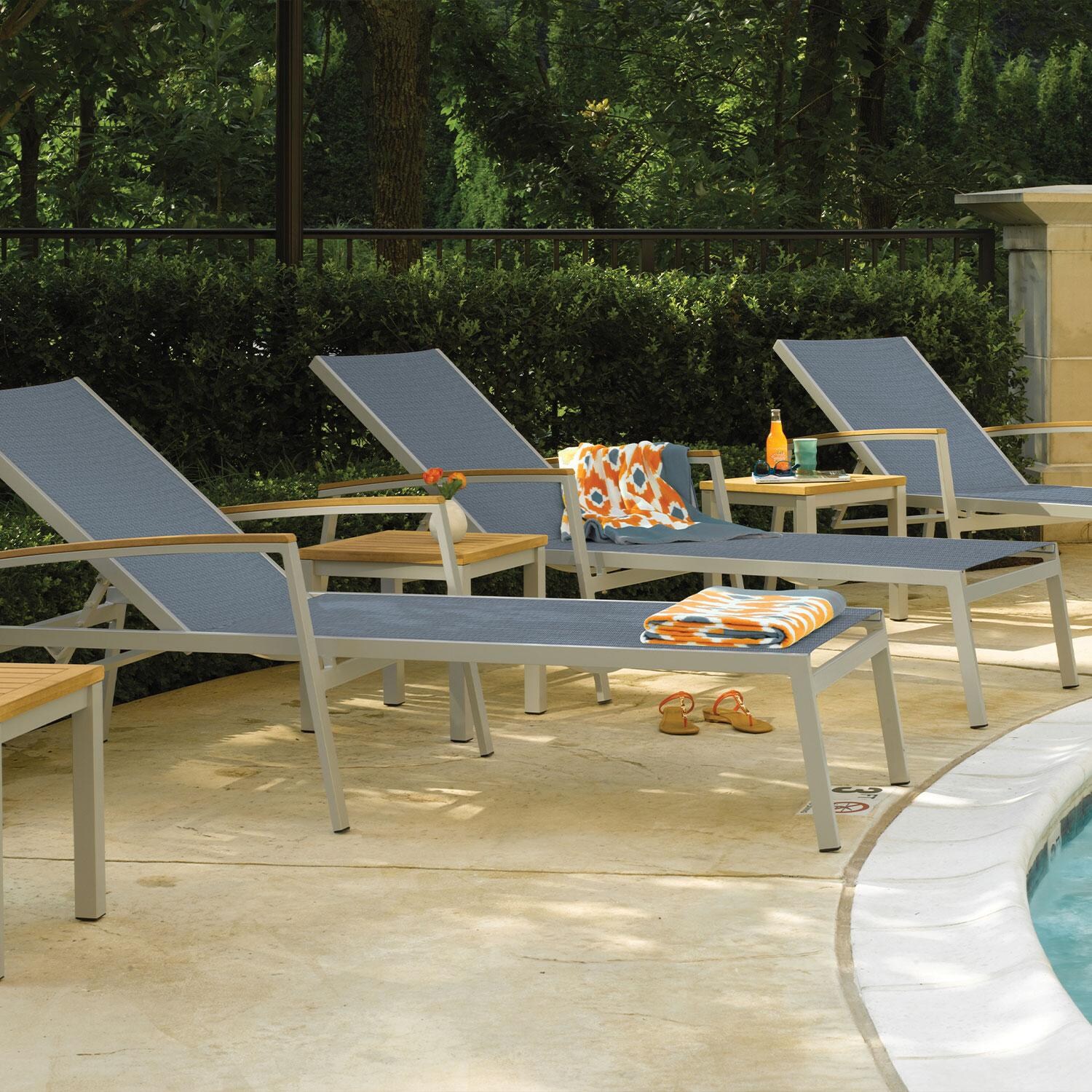 Travira 8 Pc Powder-Coated Aluminum Chaise Lounge Set in Titanium/Natural/Flint By Oxford Garden - Close Up - Lifestyle thumbnail