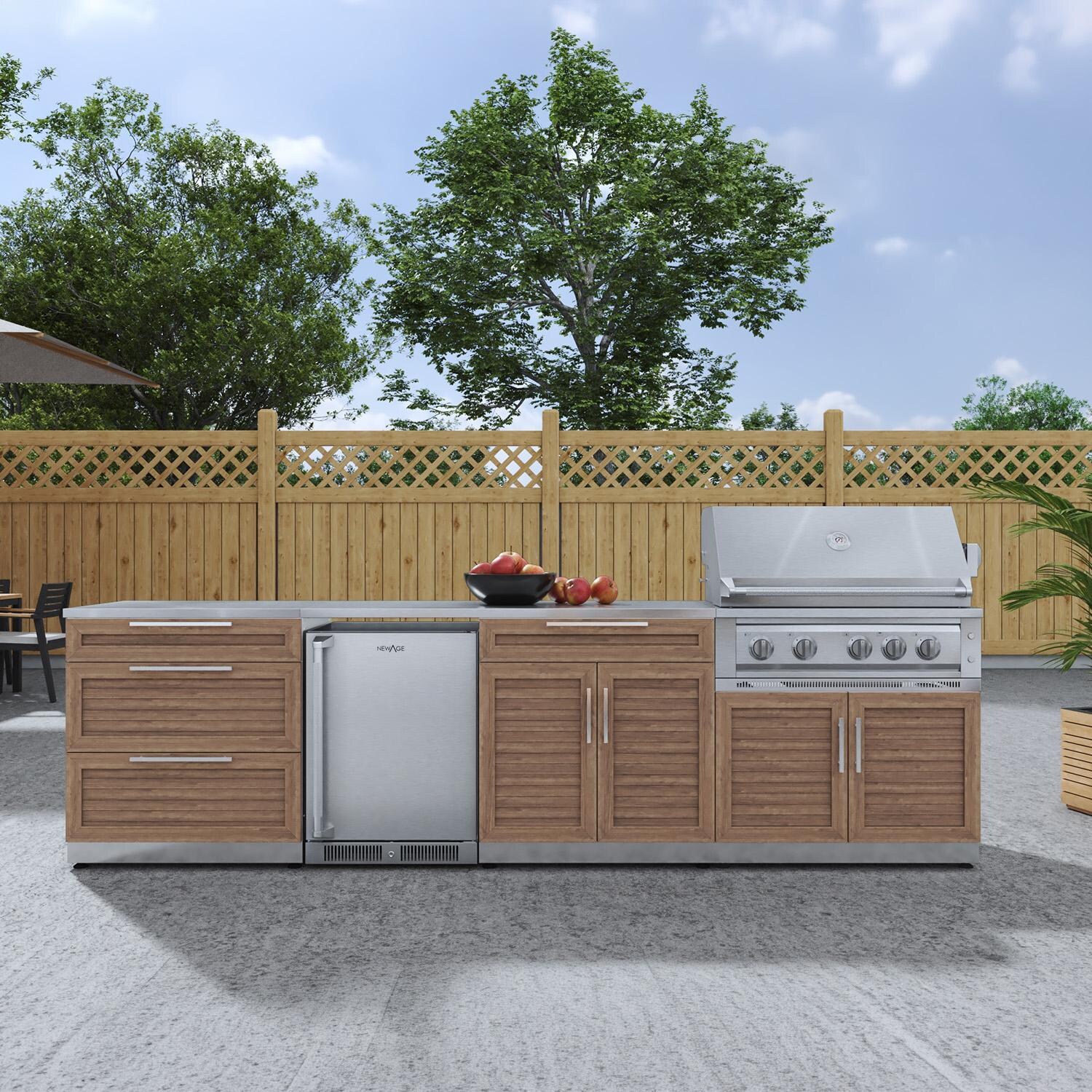 NewAge Products 67902 Classic Series 10 1/2 Ft Outdoor Kitchen Island w/ 36-in Natural Gas Grill, Refrigerator, Trash Bin, Door & Drawer in Grove/Stainless Steel - On Patio - Lifestyle thumbnail