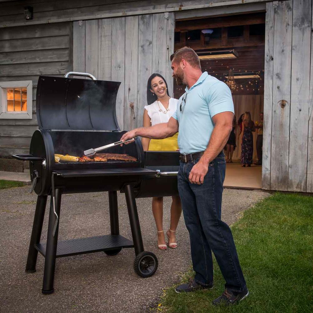Broil King 958050 Regal Charcoal Offset 500 Smoker - At the Grill - Lifestyle thumbnail