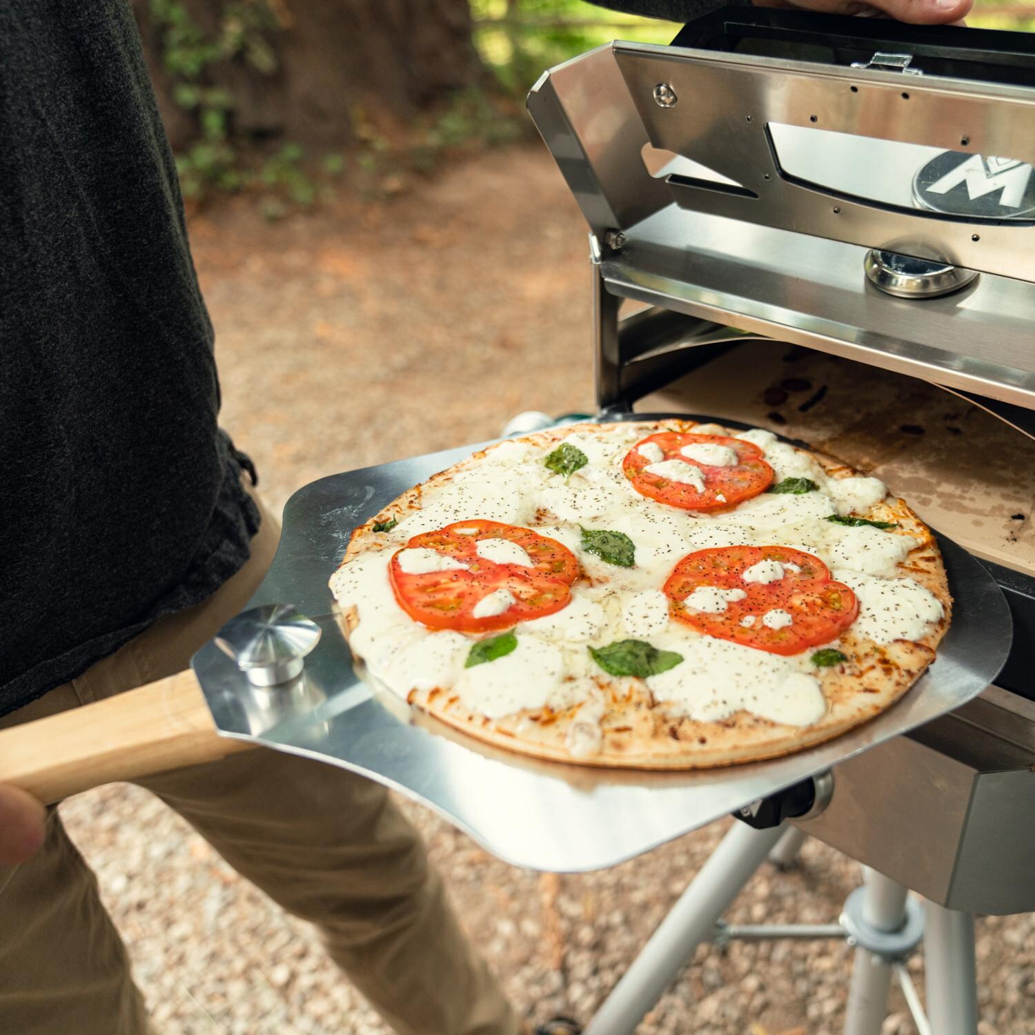 Magma CO10-270 Crossover Folding Pizza Peel - In Use With CO10-101 Single Burner Firebox & CO10-105 Pizza Oven Top Accessory thumbnail