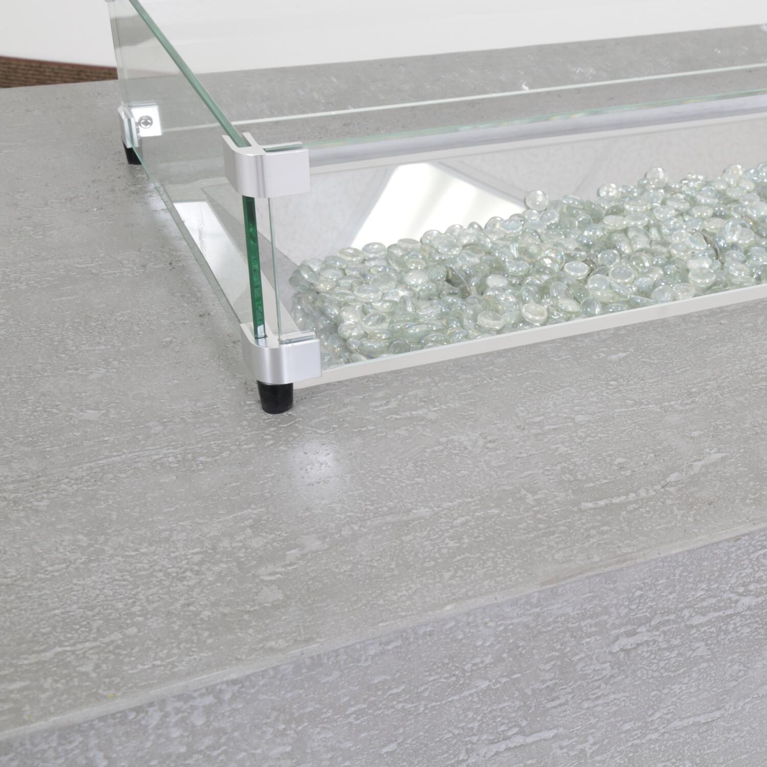 Gravelstone 60-Inch Rectangular Natural Gas Fire Table with Glass Surround by Sunset West - Detail thumbnail