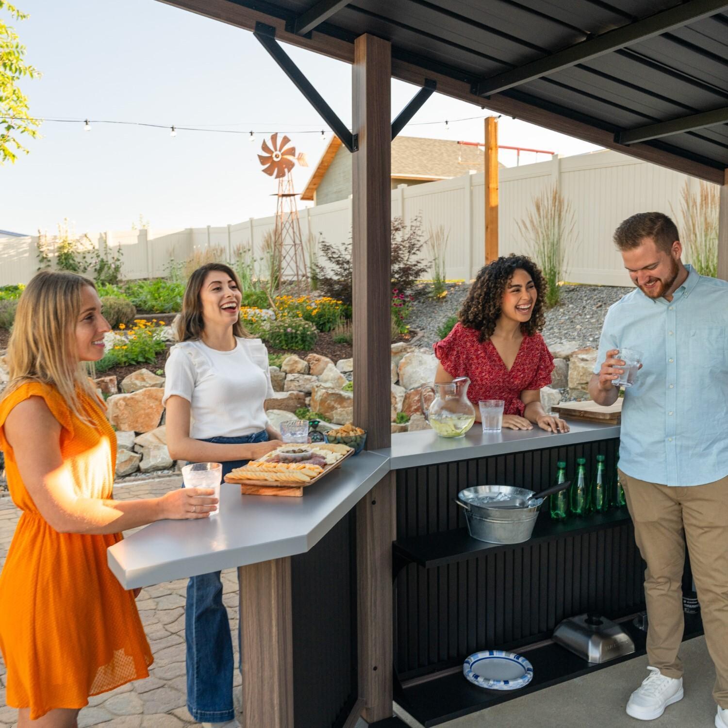 Blackstone 10 x 10-Foot Bar and Griddle/Grill Pavilion - Entertaining Friends at Bar - Lifestyle thumbnail