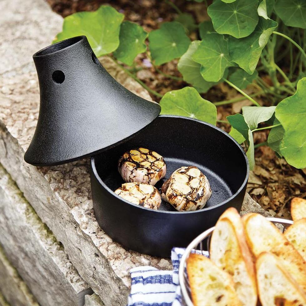 Outset  76633 Cast Iron Beer Can Roaster - Garlic in Bottom - Lifestyle thumbnail