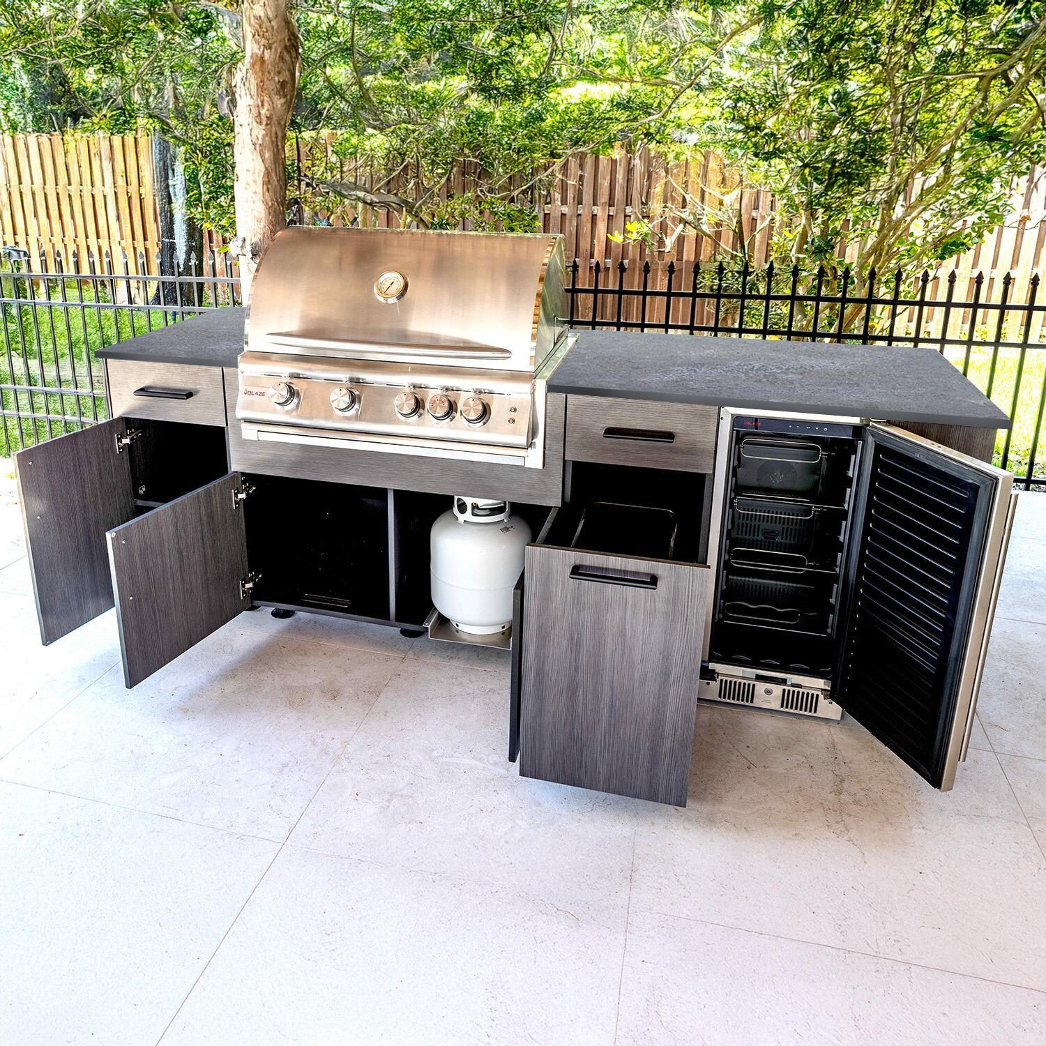 BBQGuys Signature Oasis 8 Ft Outdoor Kitchen Island w/ Blaze Propane Grill & Refrigerator in Grey Cedar/Lunar Grey - Open - Lifestyle thumbnail