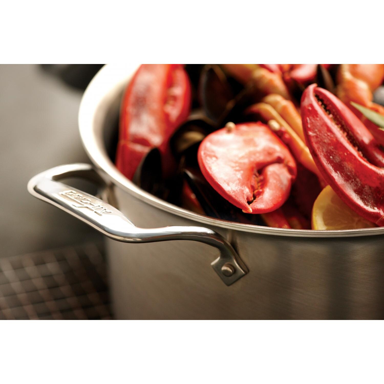 All-Clad D5 Stainless 8-Quart Stock Pot With Lid In Use thumbnail