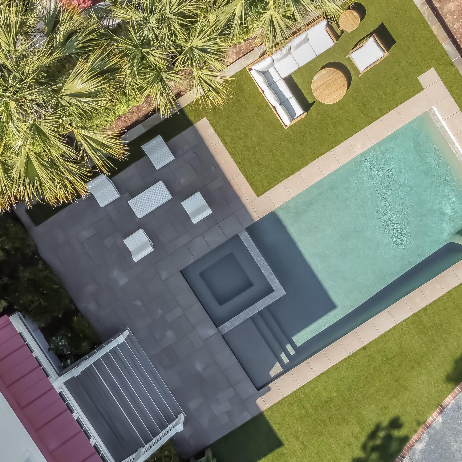 Teak + Table Breeze Wicker Patio Armless Club Chair in Off-White Cane - Alternate Birds Eye View - Lifestyle thumbnail