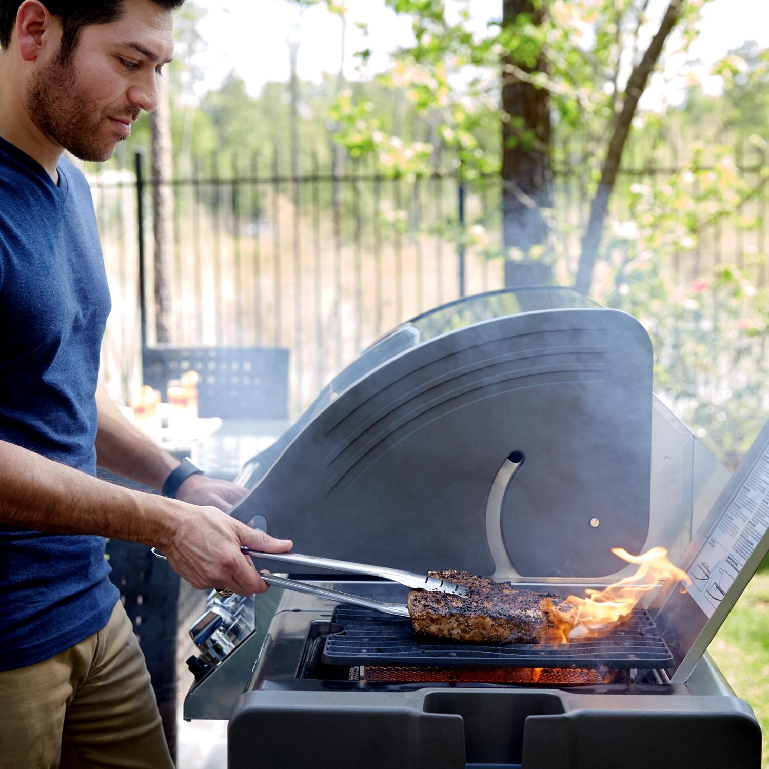 Napoleon LEX 485 Propane Gas Grill - Searing Steak on SIZZLE ZONE Infrared Side Burner thumbnail