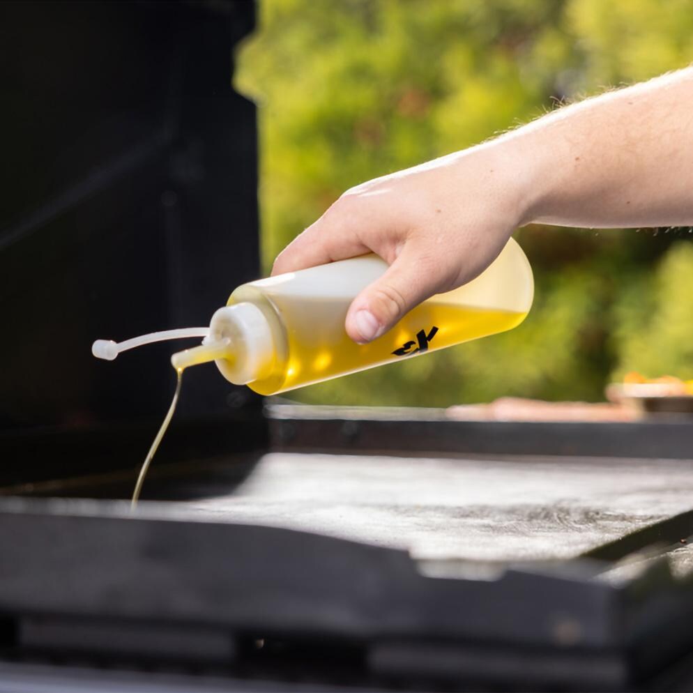 Camp Chef SPSET7 Griddle 7- Pc Essentials Kit - Using Bottle - Detail thumbnail