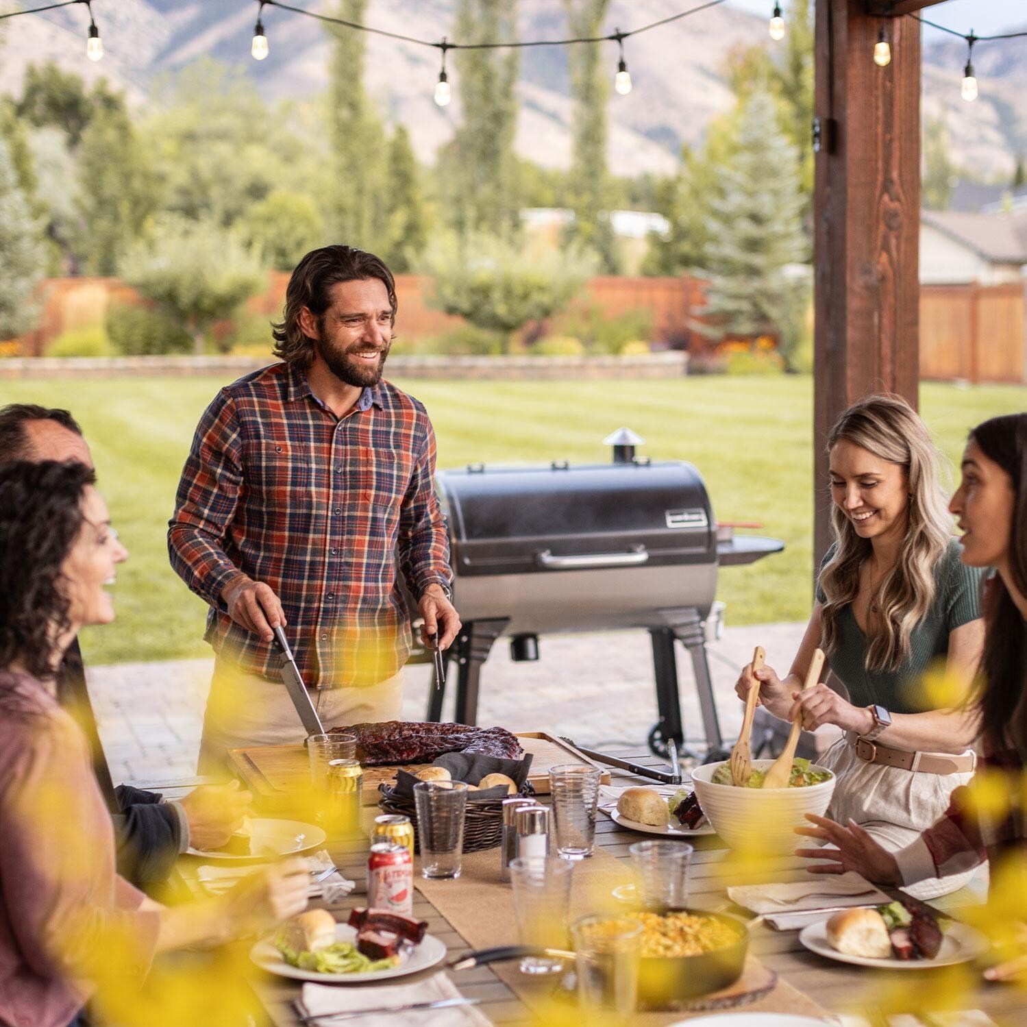 Camp Chef PG36SSG Woodwind SS 36 Pellet Grill - Eating Lunch Outside W/ Friends - Lifestyle thumbnail