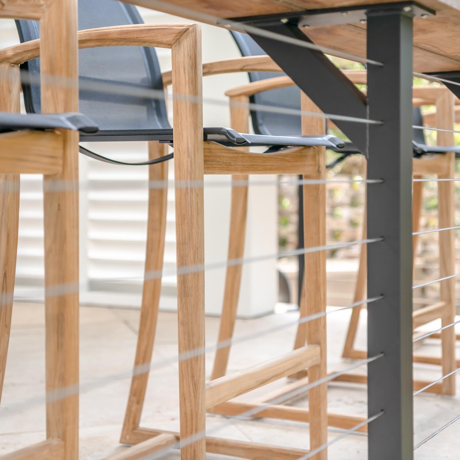 Teak + Table Capri Sling Bar Chair in Black - Leg Detail - Detail thumbnail