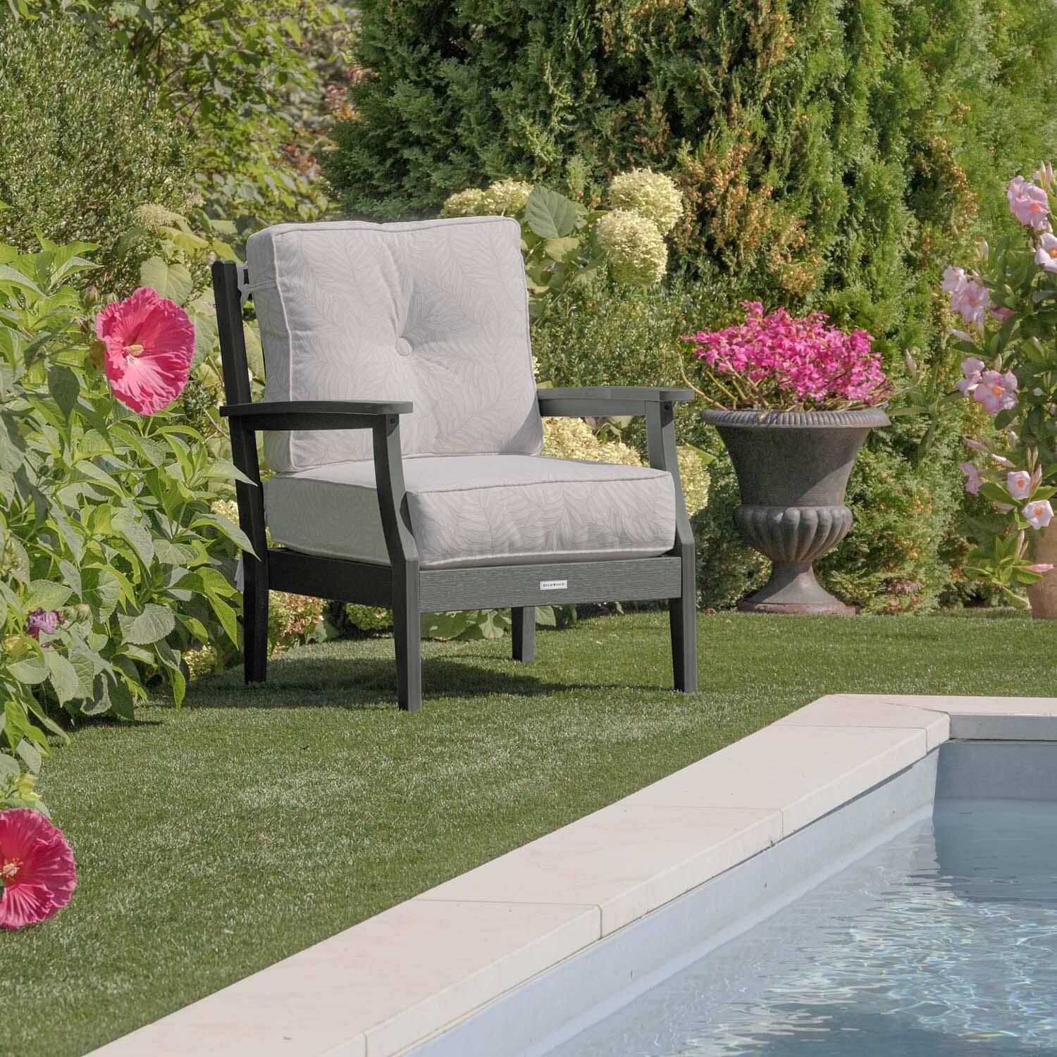 Blushing Bay Recycled Plastic Club Chair in Lively Parchment/Coastal Teak by Lakeview Outdoor Designs - In Garden - Lifestyle thumbnail
