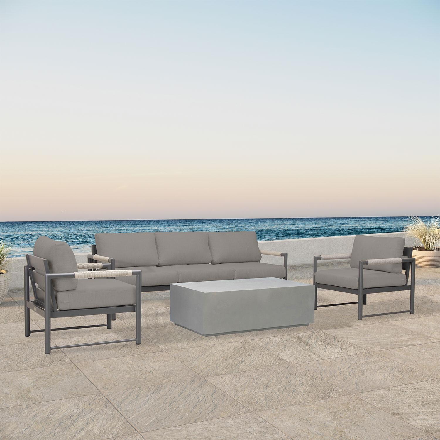 Lakeview AVEBAY-SL-PG-SET135-CC Avenue Bay Slate/Pebble Gray 4 Pc Sofa Set - Canvas Charcoal - Angled On Patio - Lifestyle thumbnail