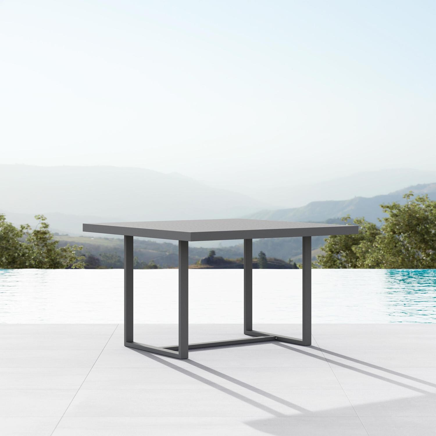 Azzurro Living Pavia 48 Inch Charcoal Aluminum Dining Table - Lifestyle thumbnail