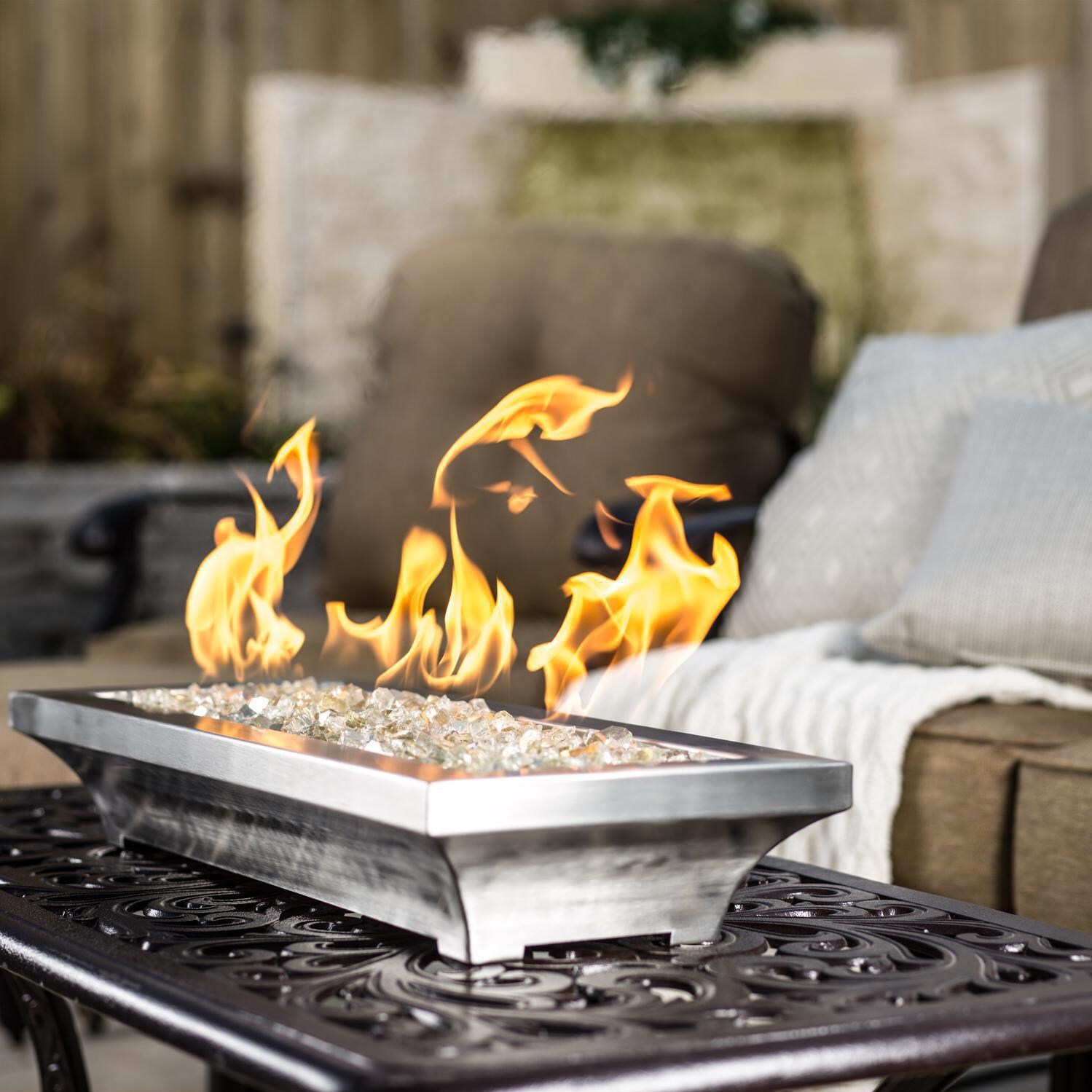 BBQGuys Signature Series Lavelle 24-Inch Table-Top Natural Gas Fire Pit - Stainless Steel - Side View - Shown with 1/2 inch White Gold Reflective Fire Glass thumbnail