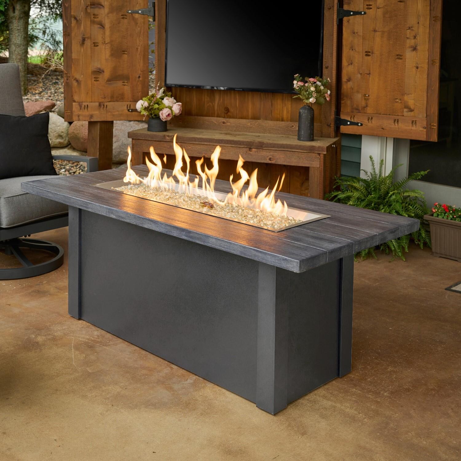 Havenwood 62 Inch Propane Fire Pit Table W/ Carbon Grey Top & Grey Base - Lifestyle thumbnail