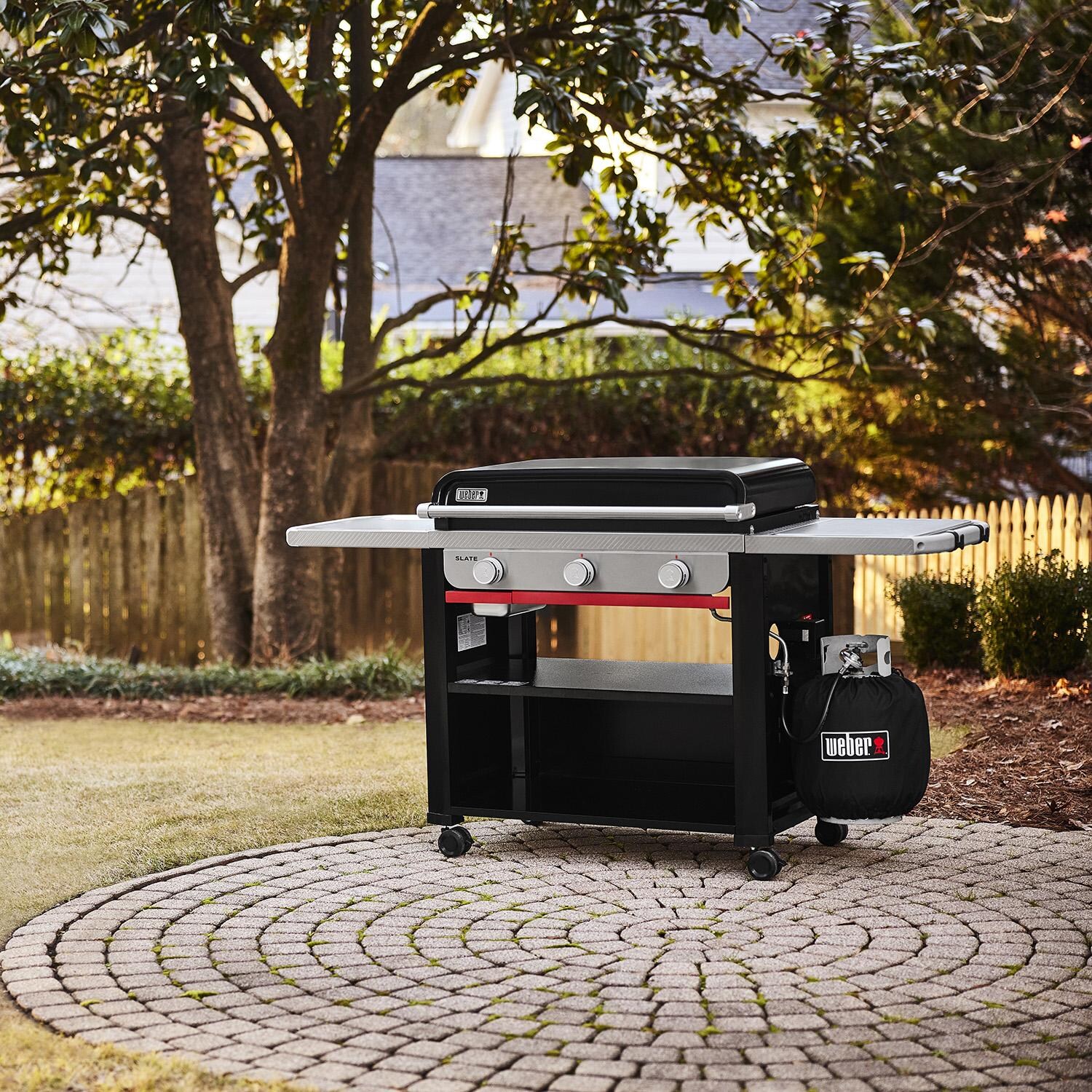 Weber 1500014 Slate 30-in Rust-Resistant Propane Griddle - On Patio Closed - Lifestyle thumbnail