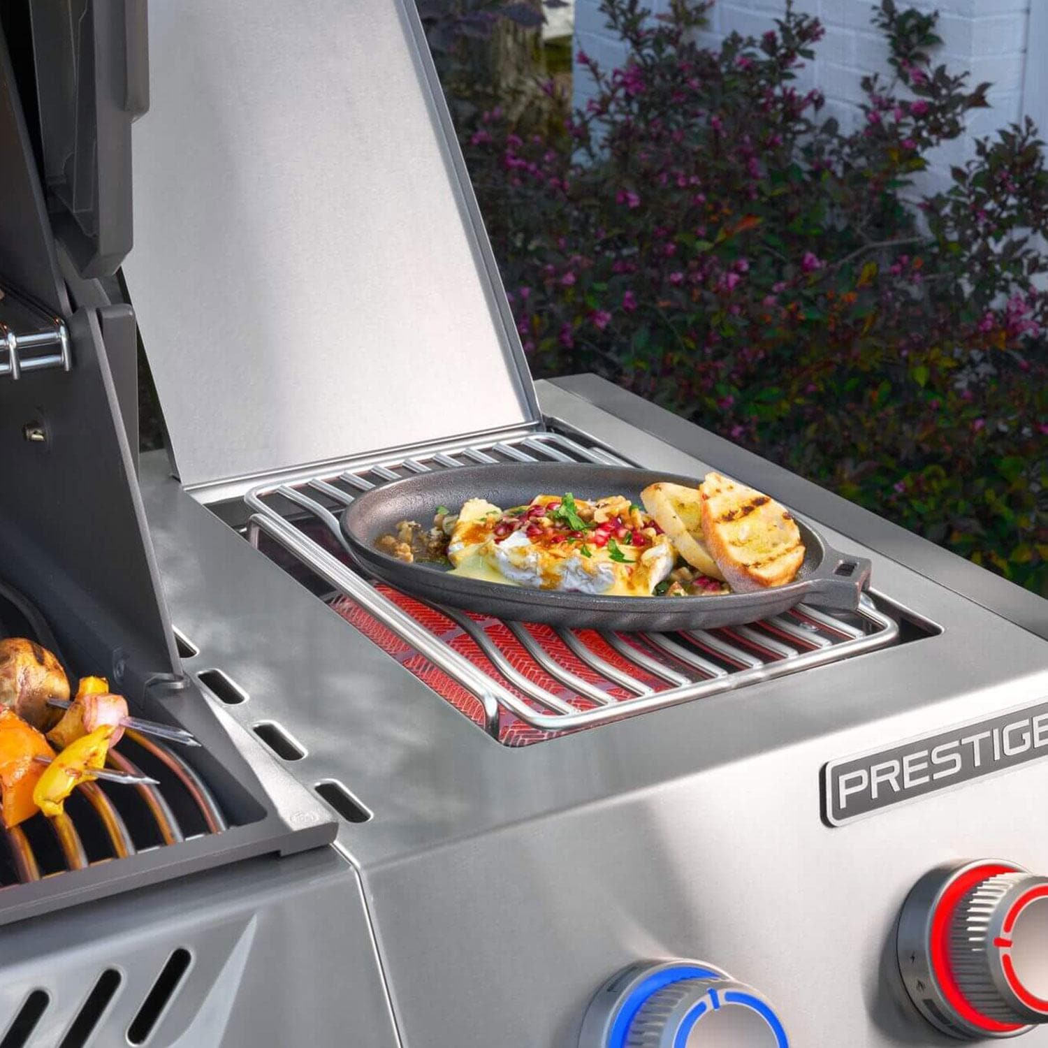 Napoleon PRO500VXRSIBPSS Prestige PRO 500 4 Burner Propane Grill w/ Smart Technology - Grilling on Side Burner - Lifestyle thumbnail