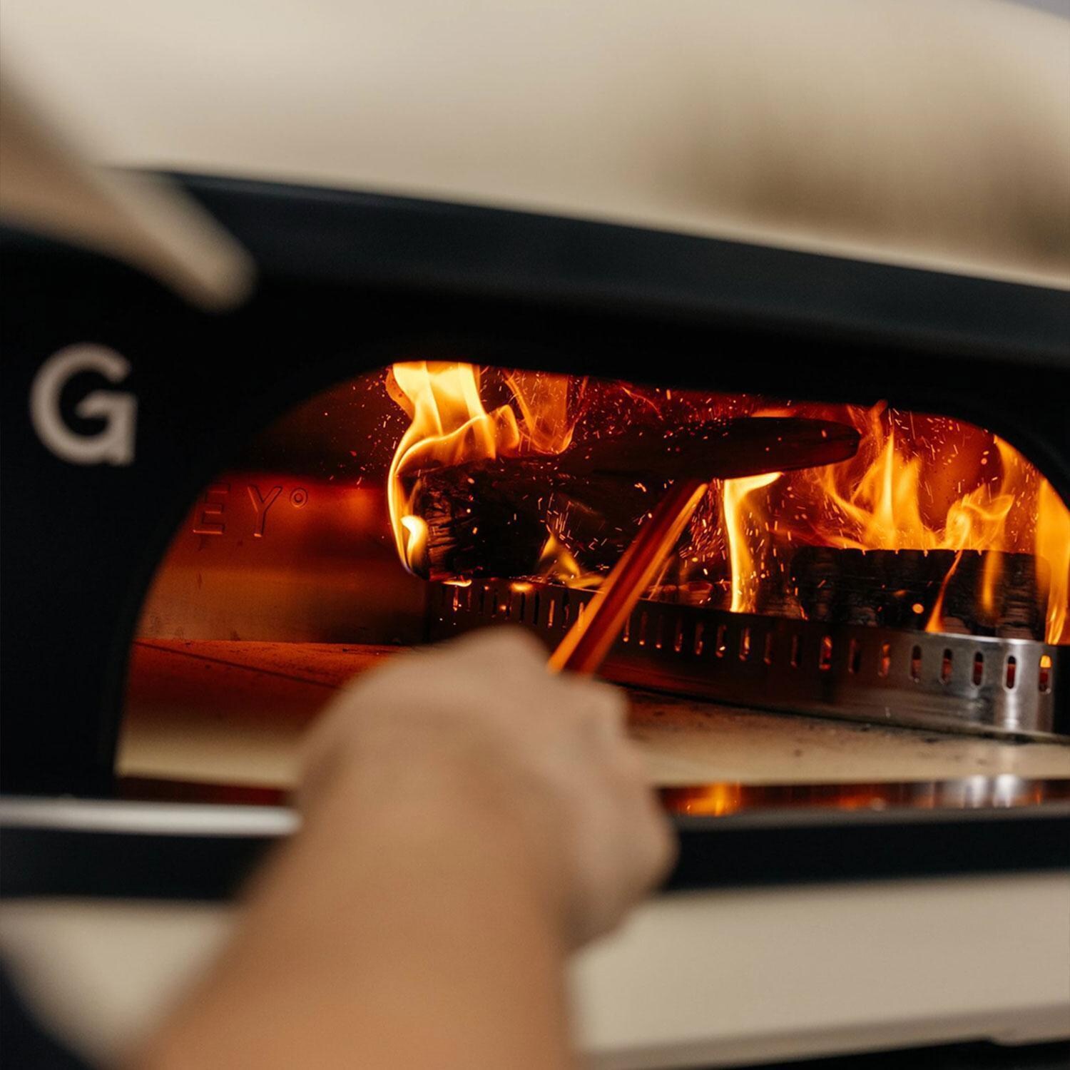 Gozney GMPBNUS1825 Dome XL Gen 2 Propane Pizza Oven - Bone - Burning Wood - Interior - Lifestyle
