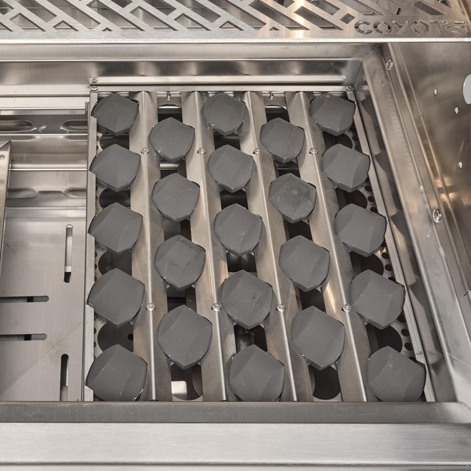 Coyote SL-Series 36-in 4-Burner Propane Grill - Briquettes - Detail