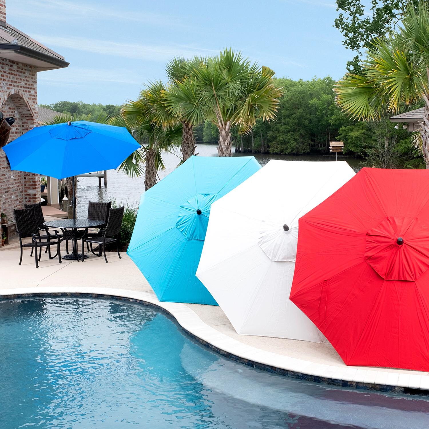 9 Ft. Octagonal Aluminum Auto Tilt Patio Umbrella W/ Crank Lift and Base By BBQGuys - Poolside Lifestyle Shown With Patio Furniture Set thumbnail
