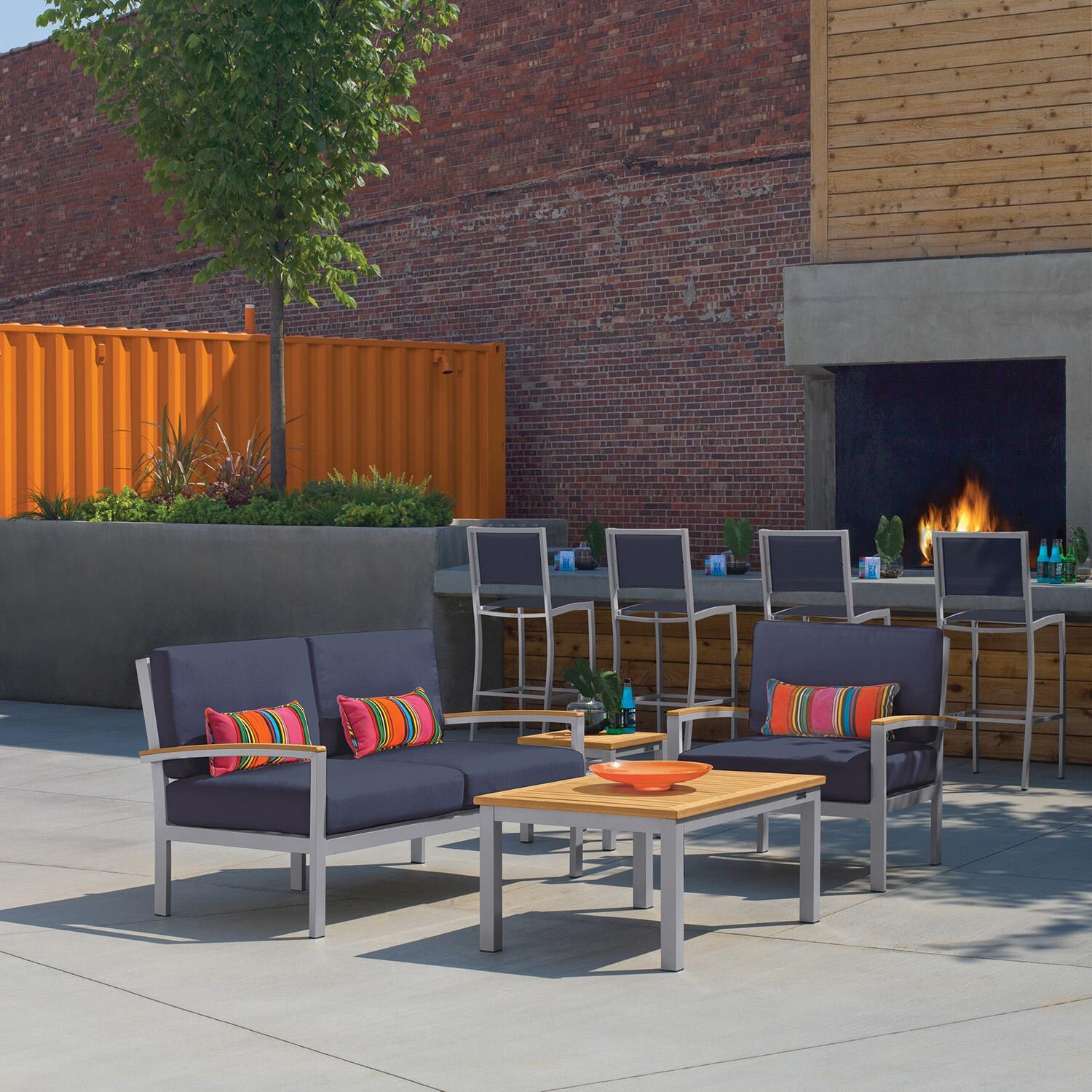 Travira 4 Pc Aluminum Seating Set w/ Club Chair in Natural Tekwood/ Midnight Blue by Oxford Garden