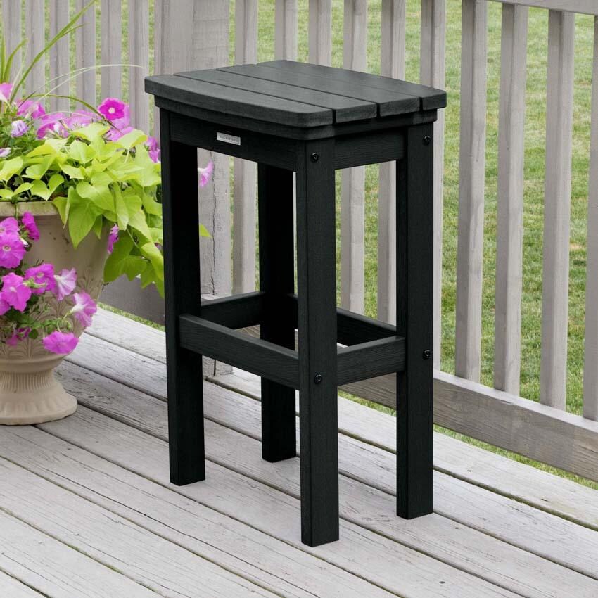 Hart Lane Polyresin Bar Stool in Black By Lakeview Outdoor Designs - Angled - Lifestyle thumbnail